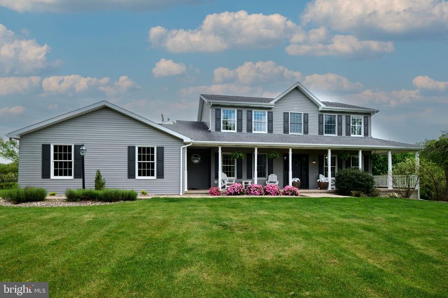 Looking for a country retreat that is still close to town? We have you covered. Welcome home to 90 Darrich Court, one of the largest and flattest lots in the Grahmpton neighborhood. Nearly 2 acres of land with plenty of outdoor living opportunities... both the front and back lawn are expansive; take in the views out front from your wrap-around porch, enjoy a barbeque with guests on your large Trex deck, and keep an eye on the chickens while roasting s'mores at the built-in fire pit on your custom paver patio. This house was built with entertaining in mind. Inside you will find thoughtful updates that include new LVP flooring throughout, an open kitchen/dining/great room space, solid surface counter tops, a double oven, and a basement studio apartment for hosting guests on Penn State football weekends... but ready for household activities the remainder of the year! Four spacious bedrooms fill the upstairs. The main-level home office features custom made floor-to-ceiling bookcases.   *Seller to replace top of current deck rail with composite material before closing.