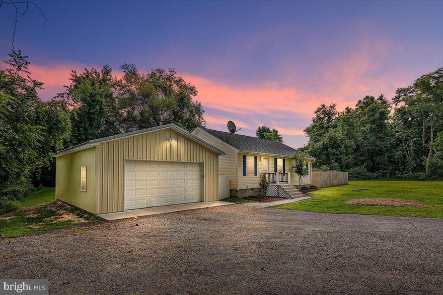 Welcome to 11285 Wallace Woods Rd in Worton Md. This home is ready for you to move in! Featuring 3 bedrooms, 2 bathrooms, a large detached 2 car garage, and a newly insulated crawlspace. As you walk in you are greeted with an open concept between the living room and kitchen with beautiful floors. Moving down the hall you will notice a laundry area, 3 bedrooms and a bathroom. As you enter the owner's suite you will love the space this room provides, with a gorgeous updated owner suite bathroom! Back outside you will notice the large 2 car garage and almost 3/4 acre of property! Set on a quiet street and just 10 minutes from Chestertown Md, you will enjoy the quiet while being close to Worton's community pool, downtown shopping, waterfront, and restaurants.