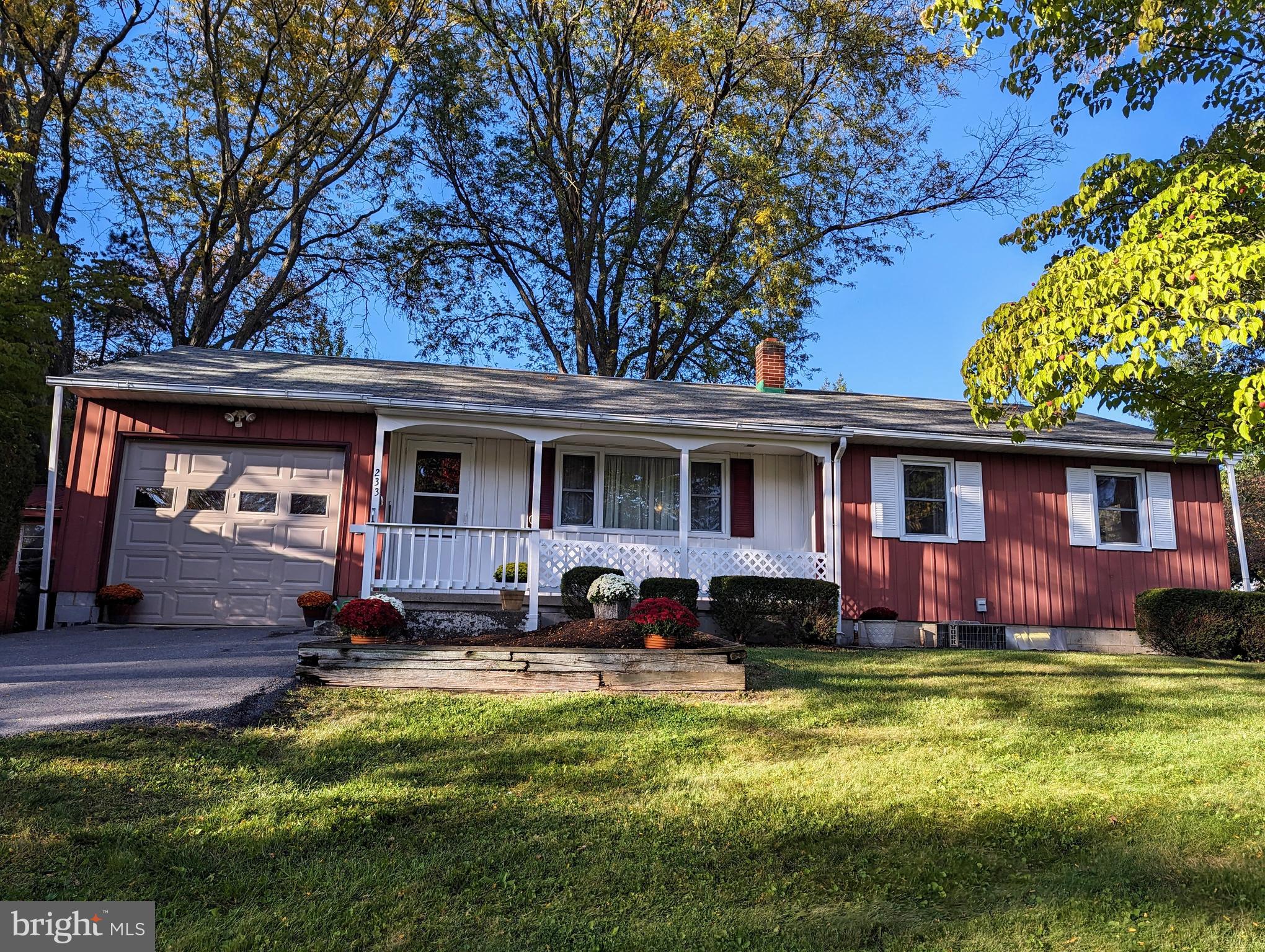 Rare opportunity to own two adjoining parcels, deeded separately, on The Hill in historic Boalsburg! The front .22 acre parcel has a charming Ranch style home, built in 1958 with 3 Bedrooms, 2 full Bathrooms, and a 1-car attached Garage, that was lovingly owned by only one family. The  first floor interior features newer windows, hardwood flooring, new luxury vinyl in the Kitchen and Full Bathroom, a spacious Living Room with large Built-In, central A/C, and a Mud Room. The full lower level offers a Family Room, Office, Full Bathroom, Laundry Room and Utility/Workshop area. The exterior features a lovely front Porch, lush landscaping with a Greenhouse, storage Shed, water fountain and large 535 sq. ft. back Deck for enjoying time outside! Harpster Park is just a short one block walk away. The adjoining .21 acre parcel sits behind the home with a variety of plants, mature trees, a garden area, storage Shed, and a hedge row bordering the private lane making it very private. The Sellers would prefer selling the parcels together so the new owners can decide whether they want to live in the home and keep the beautiful back yard as is, or rent the current home and sell the back lot, or build a new home on it! It could also be a nice investment property. Come out and take a look! Located close to the PA Military Museum, Boal Museum, schools, restaurants, US-322, and only a 10 minute drive to Penn State University.
