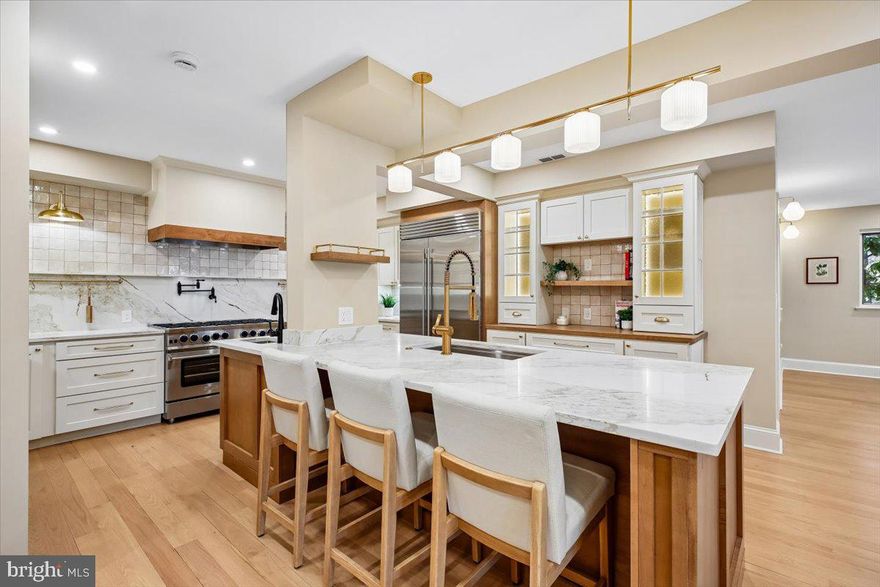 Welcome to 6317 Poe Rd, a tudor inspired colonial, offering over 5,000 square feet of beautifully finished living space where timeless character meets sophisticated modern living. This 6 bedroom, 4.5-bath gem is tucked away in the sought-after neighborhood of Woodhaven, one of Bethesda’s favorite neighborhoods, just a short distance to Burning Tree, Pyle, and Whitman High School.


At the heart of the home is a stunning brand-new chef’s kitchen designed to impress. Thoughtfully renovated with high-end appliances, custom cabinetry, expansive counter space, and abundant storage, this showpiece kitchen is as functional as it is beautiful. Perfect for entertaining and everyday living alike, it seamlessly opens to a sun-drenched family room featuring skylights and a dramatic wall of windows that flood the space with natural light. Just beyond, step onto the deck overlooking the lush, private backyard—an ideal setting for outdoor dining and gatherings.

The main level continues to delight with a warm and inviting living room anchored by a charming stone fireplace, a formal dining room perfect for hosting, and a spacious office with custom built-ins. A powder room completes the level,

Upstairs, the luxurious primary suite offers a serene retreat with a spa-inspired en-suite bath and generous closet space. Four additional bedrooms, two full baths, and a convenient laundry room provide comfort and functionality for today’s lifestyle.

The fully finished walk-out lower level offers exceptional versatility with expansive recreation space, an additional bedroom and full bath, plus abundant storage—ideal for guests, a home gym, or additional office space.

This home is further enhanced by an energy-efficient multi-zoned geothermal heating and cooling system, 38KW Kohler whole-house generator, and a 50-year transferable roof warranty (installed 2020), along with new gutters and gutter guards(2020) and an EV Charger.

Ideally located near the shops and restaurants of downtown Bethesda, with easy access to major routes to DC and Virginia, and situated within the coveted Walt Whitman High School district.
Don’t miss this incredible opportunity to own a truly great home! From the moment you step inside, you’ll appreciate the comfort, charm, and thoughtful features throughout. Whether you’re relaxing at home or entertaining guests, this property offers the perfect setting to create lasting memories. A must-see that you won’t want to pass up—come experience it for yourself and fall in love!