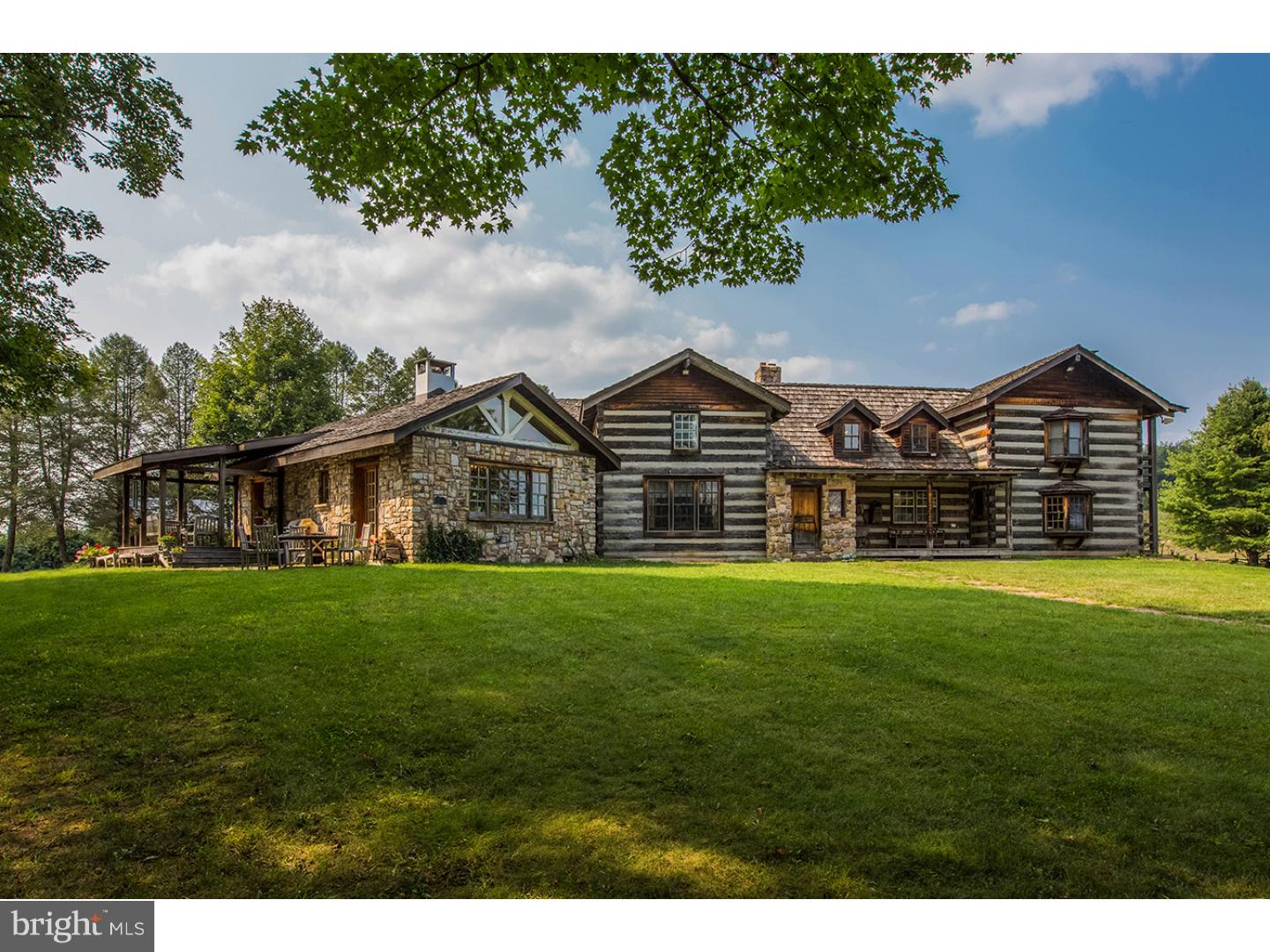 You'll find something for everyone at this one-of-a-kind rustic family retreat comfortably situated on 741 private acres in the bountiful countryside of Benton, PA. The 5,000 + square foot log cabin style home created from hand-hewn logs is light & airy, offering a French Country elegance with hemlock floors throughout and plenty of windows offering an abundance of natural light. The open and flowing floorplan is perfect for entertaining as well as cozy nights spent with the family. The gourmet chef's kitchen is delightful for the cook in the family to display their culinary wares, complete with two dishwashers, a commercial grade Garland range with 6 burners and griddle, a quad Traulsen fridge coupled with an oversized Sub-Zero, 2 farm sinks, custom cabinetry and a stunning fireplace. The oversized pantry offers a second Traulsen as well as another Sub-Zero fridge, and plenty of space for storage. A spacious mud room, laundry room, living room, dining room, family room, den/office and additional butler's pantry round out the first floor. Upstairs, you'll find 4 bedrooms, 3 of which are en-suite, as well as a reading nook on one side, and the master suite on the other side of the home ? complete with oversized dressing room chock full of custom built-ins, large master bath finished in marble, and a warm and neutral sleeping area with a balcony and beautiful built-in window seat. Outside you'll find a beautiful 13 foot pond with dock, & a "pond house" with tiled shower and sauna. Camp-out in the one room cottage built to mimic the main home. There is a workshop with two bedrooms and full bath upstairs, as well as a school house containing another bedroom, full bath &kitchen (could be used as a caretaker's cottage), charming potting shed with wood-burning fireplace, huge 200-year-old livestock barn made with peg construction (pine stalls & brick floor), fenced pastures, 60 X 120 covered riding ring, training ring, professional dog kennel (with 5 fenced in yards, 7 outdoor covered runs, 6 indoor/outdoor runs, whelping pen & training ring), oversized 3 car detached garage with hangar for private plane, grass air strip and stunning long distance views, every which way you turn. Words cannot accurately describe the true magnificence of this glorious sanctuary. Clean & Green tax abatement program; fields have never been sprayed w/ pesticides. Buyer must be able to produce proof of ability to purchase prior to confirmation of showing.