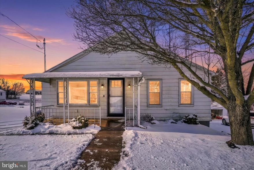 Welcome to this adorable renovated Rancher, boasting a large backyard with beautiful views of rural open space and a convenient location that balances country living with easy access to local shopping and dining, I-83 and the PA/MD Line! A covered front porch entry with a new front door reveals an inviting, freshly painted interior enhanced with handsome new LVL flooring throughout, spacious living room with picture window, a beautiful new kitchen with granite countertops, full complement of SS appliances and a large prep island with breakfast bar, renovated bath and generous bedrooms. Many comfort and efficiency upgrades offer peace of mind and cost savings, including newer replacement windows, newly installed drywall and insulation on exterior-facing walls, new furnace and central AC, new septic tank, and new electric, complete with new outlets and new breaker panel. The full unfinished basement includes a walk-out exit and new overhead garage door, providing plenty of storage options or potential to finish for additional living space. Off-street parking for 4 vehicles and a level backyard complete this move-in ready home. Unpack and relax worry-free!