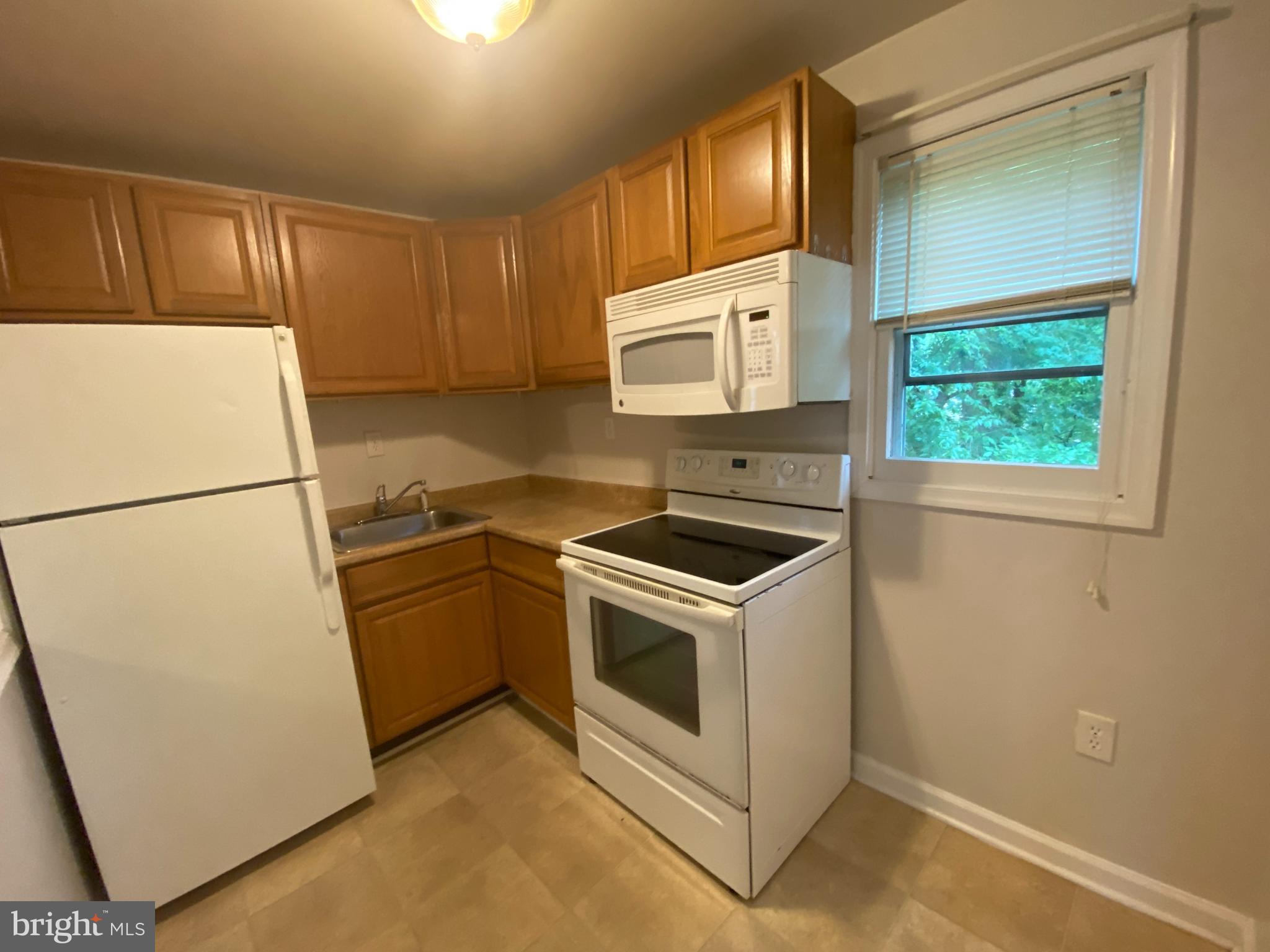 ELLA L. COX - Residential Lease