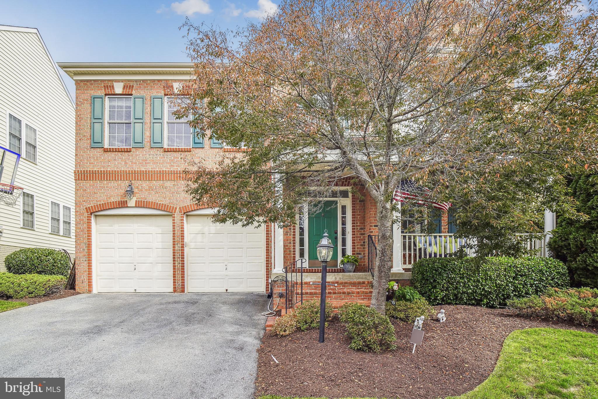 Welcome to 23211 Linden Vale Drive, a beautiful 4 bedroom, 4.5 bath home sited on a level fenced lot in the sought-after community of Arora Hills. It offers acres of community green space and a multitude of recreational amenities including a community clubhouse, two pools, walking trails, tot lots, pocket parks and natural streams. As you approach this former model home you’ll immediately be impressed with the cozy front porch. As you step inside, you’ll be in awe with the upgraded wood floors that flow on the dramatic main level. This floor offers a living room, formal dining room, butler’s pantry, two-story family room with floor-to-ceiling stone fireplace, office, laundry room and an amazing, updated gourmet kitchen and breakfast room. The kitchen is a chefs dream with 42” charcoal cabinetry, quartz counter tops, ceramic tile backsplash, stainless steel appliances (JennAire refrigerator, Wolf 5 burner gas cooktop, Wolf double wall oven, GE Monogram dishwasher), recessed lights and an expansive island. This open layout seamlessly connects the breakfast room that opens to the large deck for outdoor dining or relaxation. The upper level is home to four bedrooms and three full baths. The primary bedroom suite with gas fireplace and sitting room with wet bar is the ideal retreat after a long day at work. It features a spa-like bath with dual vanities, soaking tub, gas fireplace, glass enclosed shower and two walk-in closets. The large second bedroom is ensuite and the third and fourth bedroom have a convenient buddy bath. Another highlight of this level is the low maintenance LVP floors. The finished lower level of this home offers the perfect space for relaxing and entertaining your most honored guests. It boasts a massive recreation room with wet bar, guest bedroom/office, exercise room, full bath, and finished storage room. French doors open to the stairs to the fenced backyard. This spectacular home has it all and the location can’t be beat. Close to schools, shopping, restaurants and Ovid Hazen Park with its playgrounds, picnic pavilions and multitude of ballfields.