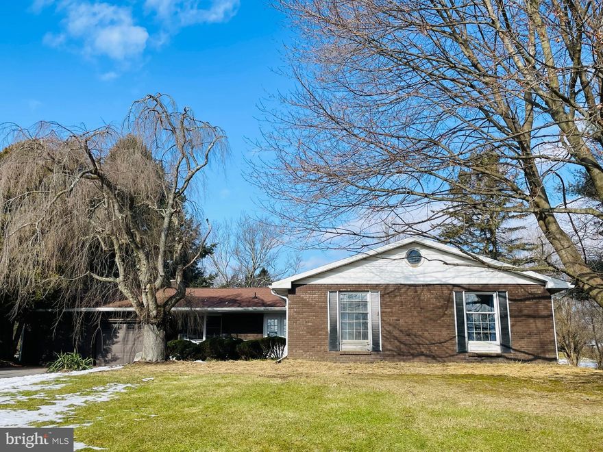 A spacious brick ranch situated on a low traffic cul-de-sac with quick access to State College's best shopping, restaurants, and the bike path into campus and town, this home is a great opportunity for any buyer!  With over 2,000 square feet of living space, you get four bedrooms, two full baths, combined kitchen/family room, large living and dining rooms, an unfinished basement, a three season porch, and a two-car garage. Many of the original finishes remain and this home will make a perfect project for someone that wants to add their own taste and design. The .54 acre lot provides a big yard.  A 14-month buyer home warranty is offered for peace of mind.