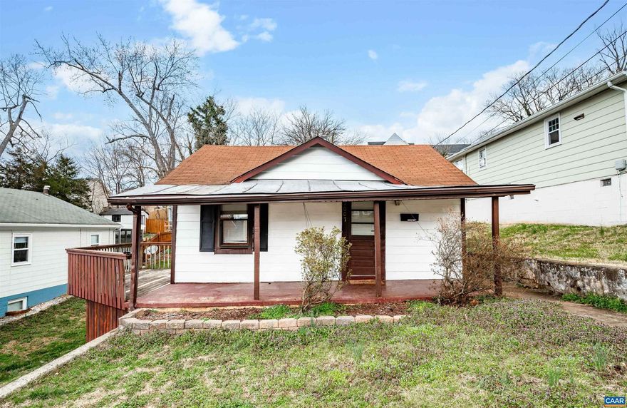 Investors look here! Here's your chance to get involved with a city project in the desirable Belmont neighborhood. Within walking distance of shops and restaurants on the downtown mall, easy access to the CAT line, short drive to I-64, walk to Belmont Park, Quarry Park and IX Park. It's currently set up as three separate units. There is a lot of potential in this home!,Formica Counter,Wood Cabinets,Wood Counter