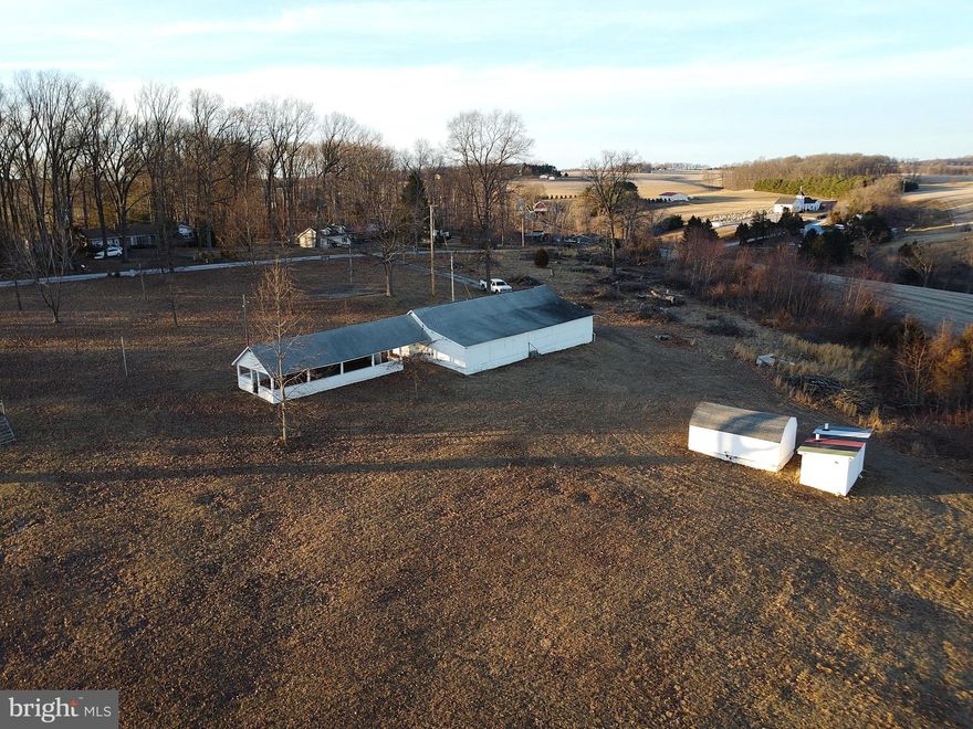 Spring is here...!! Amazing property with stunning country views and endless possibilities. Nestled in picturesque Chanceford Township this expansive property offers breathtaking views, you can see for miles! Currently home to a church pavilion, this property has all kinds of possibilities. You would need to check with Chanceford Township, but imagine wedding receptions, or other special occasions, a youth group property, an orchard, vegetable farm, vineyard, maybe even build your dream home? Property has endless potential.
Just imagine entertaining your family with the tranquil beauty of nature. This is more than just a piece of land; it's a rare chance to do something special!