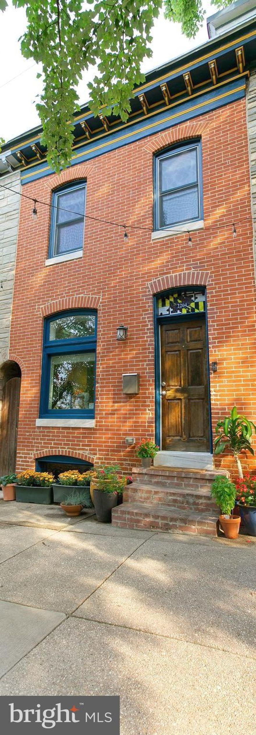 Beautiful 3 bedroom, 3 full bath row home  in Upper Fells Point.  Save extra money on taxes with a CHAP tax credit that is good until December 2023!  This home has a perfect blend of original, historic charm but with today's updates added.  Complete gut renovation in 2013.  Private driveway in back for one car parking along with plenty of angled parking spots available out front.  Fantastic location just 1/2 a block from Patterson Park.  Enter home through front door with custom made, stained glass Maryland flag/crab glass transom.  Relax in the 15 foot wide living room with original hardwood flooring and exposed brick.  Head into the open kitchen with breakfast area, recessed lighting, tile flooring, granite counters and stainless steel appliances.  Plenty of windows along the side of the home let in tons of natural light.  Main level includes a third bedroom with full bath that can also be used for a home office/den if desired.  Head up the original curved staircase to two more large bedrooms, both with ensuite full baths with travertine stone flooring and pocket door.  Enjoy entertaining in your fenced in private, back yard space.  Some recent updates include in January 2021 all exterior brick in rear of home was repointed, patched and painted.  In August 2021 the walkway along rear side of house was completely sealed.  Rear addition of home is also enhanced with hardiplank siding.   Enjoy nearby restaurants, shopping and walking/jogging paths along the water.  Easy commute to Johns Hopkins Hospital, Johns Hopkins Bayview, I83 and I95.  A MUST SEE!!