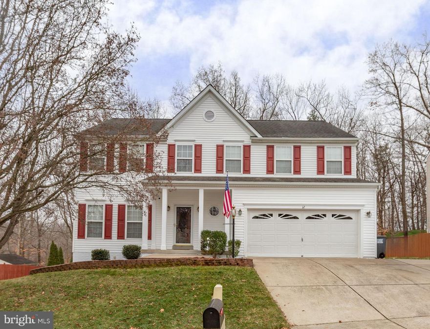 3 level LARGE colonial in desirable Stafford County with easy access to I95, VRE, hospital, commuter lots, shopping & schools.

The main level features a welcoming living room and formal dining room, a convenient half bath, and a mud/utility room with a wash tub off the 2-car garage. The kitchen is well-equipped with a dishwasher, stove, microwave, and refrigerator with icemaker, plus a handy desk area, oversized pantry, center island, and sunny eat-in nook leading to the deck overlooking trees. Just off the kitchen, step out to the deck and enjoy seamless indoor-outdoor living. The dining area flows into a lovely sunroom/three-season room—perfect for morning coffee or winding down at the end of the day, also overlooking trees and connecting to the deck. The family room includes gas-log fireplace.

Upstairs you’ll find three generously sized bedrooms, a full hall bath, and a large upstairs laundry room with ample hanging space. The primary suite is truly a retreat—huge in size with double walk-in closets featuring built-ins, a recessed entertainment nook, and a spa-style en-suite bath with a separate shower, jetted tub, private water closet, dual-bowl vanity plus a separate vanity area, and ceramic tile flooring.

The finished walk-out lower level adds even more versatility with a spacious recreation/family room with built-in shelving, a full bath with ceramic tile, and the additional 4th bedroom (NTC)-ideal for guests, hobby space, or home office. Walk out through double doors to the side yard and enjoy the wooded backdrop.

Outside, you’ll appreciate the concrete driveway with extra third-car parking pad, a 2-car garage with built-in storage and a storage shed in the rear—proves plenty of storage.  There is also an underground sprinkler system.  HVAC is dual zoned and has had bi-annual checks on a regular basis.  Alarm system also.  Seperate junction box by panel box for portable generator hook up.  Surge protector on panel box.

Master bath jetted tub (no timer-requires manual pump engagement for jets to work).