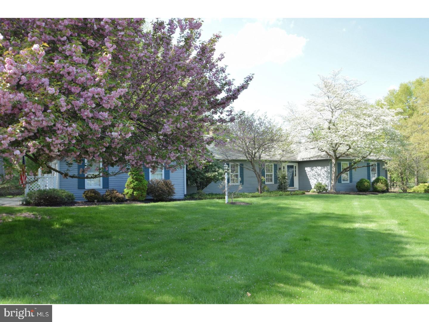 Welcome home to this lovely cedar sided ranch in desirable Solebury Township, just steps from the scenic towpath yet tucked into a stunning lot with a backdrop of woods and mature landscaping. Enter the foyer that opens to a spacious and open living room with brick surround fireplace and formal dining room. The sun drenched kitchen has natural cherry cabinets, stainless steel appliances and a breakfast room that overlooks the back yard, gardens and a perfectly secluded back yard.  Next to the kitchen is an out of the way study/office with garden window, updated powder room and spacious laundry room. A three season sun room is perfect for enjoying the views of the back yard. Warm family room adds to the entertainment possibilities and has a second fireplace and skylights.  A beautiful master bedroom suite with private bath that is updated and three additional spacious and sunny bedrooms that share a full bath. Hardwood flooring in all rooms except laundry and kitchen. Premier location in Bucks County that is minutes from several river towns, walk to the tow path, and quick access to New Jersey bridges for commute to Princeton, New York or Philadelphia.  Very close access to all of the historic river towns along the Delaware River yet escape back to this picture perfect home. This lovely home is located in the highly rated New Hope-Solebury School District.