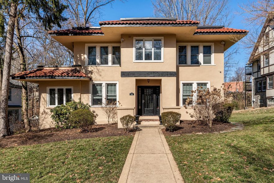 Immerse yourself in historic charm at this enchanting Spanish-style home with a gorgeous terracotta roof and almost $350k in improvements and renovations!  Step back in time to one of Lansdowne's most coveted locations, Lansdowne Court, a bucolic and friendly neighborhood framed by grand stone pillars and nestled beside Darby Creek. This beautifully updated and meticulously maintained Spanish-style residence offers the perfect blend of historic charm and modern convenience. Inside, a traditional center hall floor plan unfolds, beckoning you to explore. The sun-drenched living room boasts a classic brick fireplace and a doorway leading to a serene sunroom. Imagine relaxing here with a good book while gentle breezes waft through the windows. An additional doorway seamlessly connects the living room to a tranquil office and a charming and sunny breakfast room, ideal for intimate mornings and casual meals. Whip up culinary delights in the renovated and well-equipped kitchen and host elegant gatherings in the formal dining room. The first floor is completed by a convenient powder room just steps from the breakfast room. Step outside through the mudroom off the kitchen and revel in the beauty of the expansive multi-tiered patio gracing the vast backyard, perfect for grilling, alfresco dining, and outdoor entertaining. Notice the convenient driveway and oversized garage, making parking and storage a breeze. Back inside, ascend the stairs to the second floor of the home and discover a bright and spacious ceramic tile hall bath serving two generously sized bedrooms. But the true gem awaits you: a sprawling primary bedroom suite (that was once two separate rooms) with a large walk-in closet, offering unparalleled comfort and luxury. Unwind in the stunning recently renovated en suite bathroom, featuring cozy radiant heat flooring, a dual vanity with plenty of storage, a makeup area, a linen closet, and a magnificent glass-framed walk-in tiled shower with seating. An additional large linen closet in the hallway completes this level of the home. The basement offers almost 325 square feet of additional finished living space featuring a lounge area for relaxing and a magazine-worthy laundry room complete with a custom tiled shower for bathing the furry members of the household. There is also an abundance of overflow square footage offering even more unfinished space for hobbies or storage, and a Bilco door that leads to the aforementioned patio, garage, and driveway areas. Beyond the practicalities, this home promises endless possibilities. Imagine cozy evenings by the fireplace, sun-drenched mornings in the breakfast room, and laughter-filled gatherings in the dining room and patio. Location is key, and this home delivers in spades. Situated just two blocks from the train station, you'll enjoy easy access to the city and airport. The charming town of Lansdowne, with its library, shops, restaurants, open-air farmer's market, parks, and access to public transportation—all only a short 5-minute walk from your doorstep. Just minutes from the hustle and bustle, this haven offers the perfect blend of tranquility and accessibility. This is an opportunity not to be missed. Don't wait, schedule your viewing today and experience the magic of this Spanish-style gem!