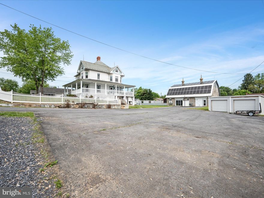 MOTIVATED SELLER SO BRING OFFERS - DON’T MISS OUT ON THIS SPECTACULAR MULTI-PURPOSE PROPERTY! Charming Early 1900s Home with Modern Amenities and 2 Separate Living Quarters! Could be Airbnb, Wedding Venue, Office Space … the possibilities are ENDLESS! Step into timeless elegance with this exceptional early 1900s property, originally built as a bed and breakfast Victorian AND with a separate horse stable—now transformed into a beautifully-updated barn. Nestled in a convenient in-town setting, this one-of-a-kind estate blends historical character with contemporary comforts. 
Main Victorian Home: This classic home features 3 spacious bedrooms and 3.5 bathrooms across a thoughtfully designed floor plan. The fully-equipped kitchen showcases original cabinetry, connecting to a bright sunroom/laundry area. An elegant dining room and expansive family room with a cozy fireplace complete the first floor. The third floor offers a stunning finished space with gleaming hardwood floors, perfect for a studio, office, or 4th bedroom. The walkout lower level includes a partially finished area with a wood stove and a full bath with direct access to the outdoor pool. 
The Renovated Barn: Once a horse stable, the 3,000 sq ft barn has been fully modernized and now serves as a flexible living and working space. The first level features spacious offices and great rooms, while the upper level offers a separate, self-contained living quarters. It includes a full kitchen, sleeping loft, luxurious bathroom with walk-in shower, sauna, and soaring ceilings with hardwood floors throughout.
Property Highlights: Energy-efficient 50 kW solar panel system (located on the barn) that covers power needs for the main house, 30’ x 30’ pool and hot tub—perfect for entertaining or unwinding, three mature grape arbors that add historic charm and outdoor ambiance, detached two-car garage for added storage and convenience.
While not currently on the historic registry, this distinctive home has been repeatedly approached for inclusion due to its rich architectural heritage and historical relevance. This property has been previously zoned business but was switched back to residential so has the potential of both. Don’t miss this rare opportunity to own a piece of history with all the comforts of modern living. Schedule your private tour today!