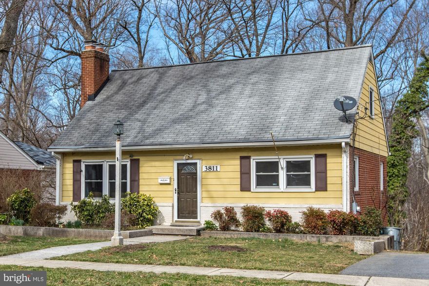 ******************************** DO NOT MISS THIS HOME - IT SPARKLES**************************THREE FINISHED LEVELS.  You will not believe the updates in this home, which is so much larger than it appears from the street.  Main level has a very nice living room with gas fireplace, a beautifully remodeled,  extended kitchen with stainless steel appliances, gas range, granite countertops , breakfast bar and an eating area which opens to deck overlooking private backyard. Two bedrooms and an updated full bath finish off this level.Upper level has three bedrooms and one full bath which can be accessed from Master bedroom and the hallway. This full bath has a Jacuzzi jetted tub with shower, and, vanity with double sinks overlooking backyard. All hardwood floors on upper two levels newly refinished. Walk-out lower level has a recreation room, laundry with extra refrigerator, lots of storage space and a large bonus room. The large private backyard is fenced and backs up to green space providing privacy and a tranquil view. There is also off street parking and sidewalks. Bring your buyers who need some space. 5BR/2FB