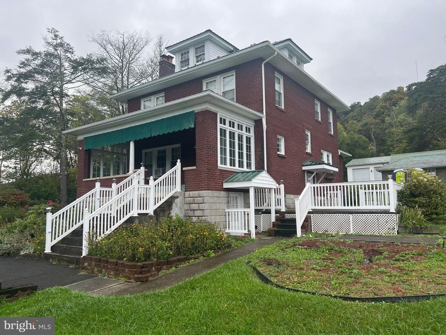 This home is rich with character, well kept and is move in ready.  The large bright kitchen with plenty of cabinets is welcoming and warm.  The 3 bedrooms  are well lit, each with closets and an office / extra small bedroom at the end of the hall.  The finished bedroom / large attic is a great additional surprise.  French doors separate the dining room from the living room or leave it wide open for your holiday dinners and parties!  The huge front porch makes summer evenings so much better and the side patio is set for your summer deck guests.  The finished basement has its own entrance, bathroom, laundry and plenty of room. The large 3 bay garage and the separate work shop/ gardening outbuilding makes storage and yard work easier and more enjoyable.  This home is outside city limits...Driveway is a right of way and is not maintained by county road dept. Come  experience it!