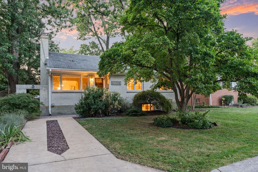 Discover the perfect blend of tranquility, convenience, and comfort in this gorgeous home. Nestled in the highly sought-after Fairway neighborhood of Silver Spring, this well-cared-for home offers a peaceful retreat within close reach of Woodmoor Shopping Center at Four Corners. Whether you like access to esteemed local schools, the scenic parks and walking and biking paths of Sligo Creek Park, proximity to shopping, entertainment, public transportation, or easy Beltway access, 10002 Grayson Ave presents an idyllic haven in the heart of Montgomery County, Maryland. Close to both downtown Silver Spring and Forest Glen, this residence offers the best of both worlds — a tranquil oasis within close reach of conveniences. The bright spacious floor plan on the main level incorporates a wood-burning fireplace, built-ins, and a separate dining room with direct access to the ultimate of screen porches and great backyard. You'll also find 3 sweet bedrooms and an updated full bath providing ample space for retreat. The lower level celebrates a huge recreation room with a full bath and storage for added convenience.  All within minutes to downtown Silver Spring, Whole Foods, movies, shopping, restaurants, and awesome weekly Farmer's Market, as well as to the Silver Spring and Forest Glen Metros. What’s more? You’ll find Sligo Creek Park nearby to enjoy walking, biking, hiking, tennis, tot lots, and more, making it the perfect place for outdoor activities and neighborhood involvement.