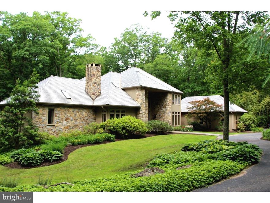 This property has it all! Fantastic Ann Capron designed 2 story contemporary with first floor master suite, 3 BR on the second level, partially finished walk out basement. 3 car attached garage. Clean lines and open floor plan, with soaring ceilings and views in all directions.  Living room with floor to ceiling large stone fireplace as the central element. Crum Creek roiling by gives the sounds of tranquility on the back deck.  4 Stall Barn exists at entrance of property with pasture to look over as you drive down driveway and through a gate to the house. Best of Both worlds, small barn and pasture on one side and house, yard, deck driveway on the other. Mudroom, kitchen office, office with fireplace by Master, main floor laundry and 4.5 baths round out the extent of this fantastic home. Newer stainless steel kitchen appliances, including Bosch Dishwasher, SubZ fridge, and double wall ovens. Large island in kitchen etc. Well maintained with newer wood shake roof. The Willistown / Radnor Hunt / Berwyn address location is convenient to all the Main Line has to offer and yet is near Willistown's open spaces for which Willistown is so well known. Just minutes away from area schools, transportation (New Paoli Amtrak Station being built), country clubs and shopping. Large protected farms nearby and Kirkwood preserve is just down the street.