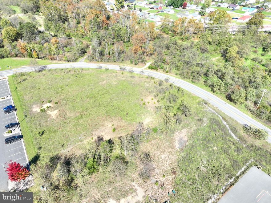 Discover an exceptional opportunity for commercial development in the vibrant vicinity of Keyser, WV. Nestled adjacent to some of the region's most significant anchors such as Walmart, Potomac Valley Hospital, West Virginia Department of Motor Vehicles, Taco Bell, and more, these prime outparcel lots promise unparalleled visibility and accessibility. With their strategic location, each lot offers an ideal size and shape for modern commercial endeavors, whether you're envisioning a retail outlet, restaurant, or service-oriented business. Moreover, rest assured that sensible covenants are in place to protect the continuity and cohesion of your project, ensuring a harmonious development that enhances the overall appeal of the area. Seize this golden opportunity to establish your business in a thriving commercial hub surrounded by reputable establishments. Contact us today to secure your place in this dynamic marketplace.