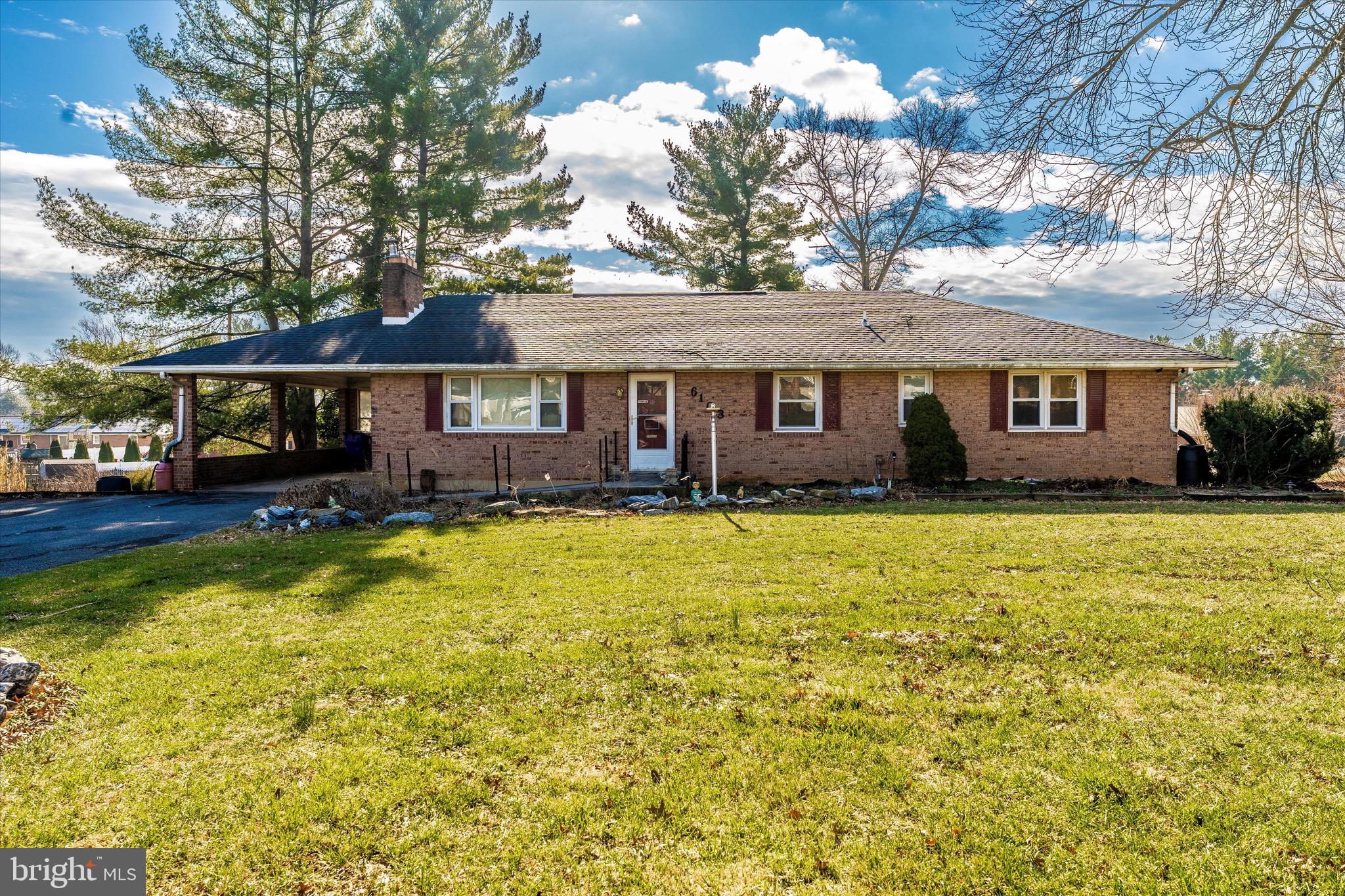 All brick rancher with 3 bedrooms and 2 full baths on the main level, carport, large corner lot, fenced in back yard, partially finished basement with full bath, 2 fireplaces, hardwood flooring and more. Newer roof and windows. This home needs some love, but is priced well below appraised value. Excellent location in Frederick with great schools. This is an Estate sale and being sold "As Is", but inspections are certainly welcomed. Optional $60 annual HOA fee to go towards common area maintenance.