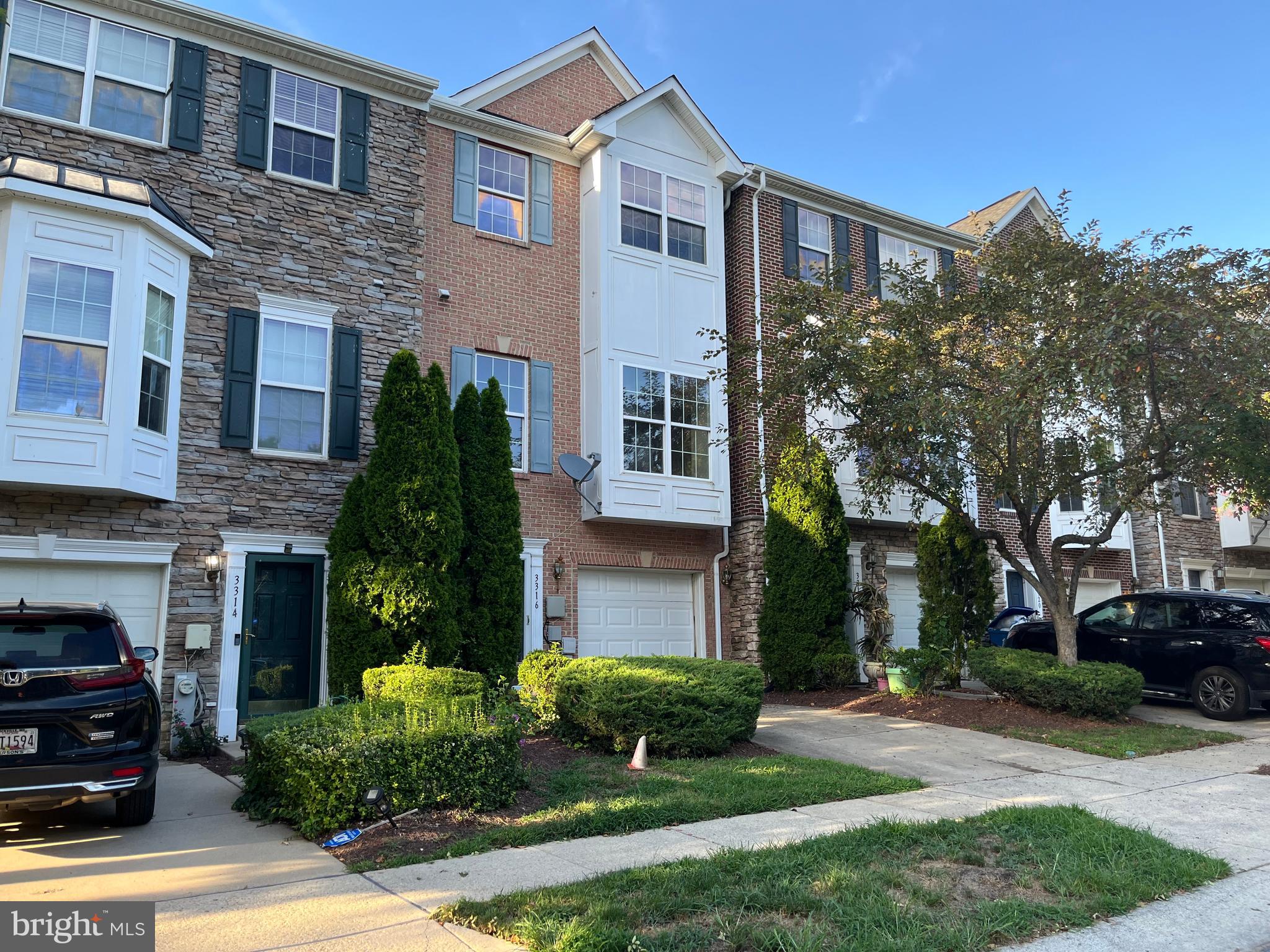 *** RARELY AVAILABLE! ✦ 2004 BUILT, BRICK FRONT TOWN HOME IN GREAT COMMUTER'S LOCATION ✦ 3 BEDROOMS, TWO (2) FULL BATHS AND TWO (2) HALF BATHS. 9 FOOT CEILING, GRANITE & STAINLESS KITCHEN APPLIANCES AND 42" CABINETRY ✦ MASTER SUITE HAS LARGE WALK-IN CLOSET WITH CUSTOM SHELVES ✦ IN SUITE MASTER BATH HAS DUAL SINKS, LARGE SOAKER BATHTUB & SEPARATE SHOWER ✦ MAIN FLOOR HARDWOOD FLOORING (NEW CARPETING IN BEDROOMS) ✦ LOWER LEVEL FAMILY ROOM HAS POWDER ROOM, GAS FIREPLACE AND FULL-SIZE FRONT-LOAD WASHER AND DRYER ✦ LARGE DECK FOR COOKOUTS BACKS TO TREES (not to other homes) ✦ JUST PAINTED ✦ DRIVEWAY AND 1-CAR GARAGE WITH STORAGE. ✦ SELLER OFFERS A 1-YEAR HOME WARRANTY AND OTHER BUYER CONCESSION ✦ YOUR HOME FACES A LARGE CENTER BLOCK COMMUNITY PARK WITH STONE PATIO AND PLAYGROUND ☛ ☛ ☛ LOCATION: ON THE Route 29 Corridor; just steps to Bus Line Z-9 & Z-11 / minutes to grocery, restaurants, shops, Briggs Chaney Road, Routes 29, 95, 198, 200 (ICC) and 495