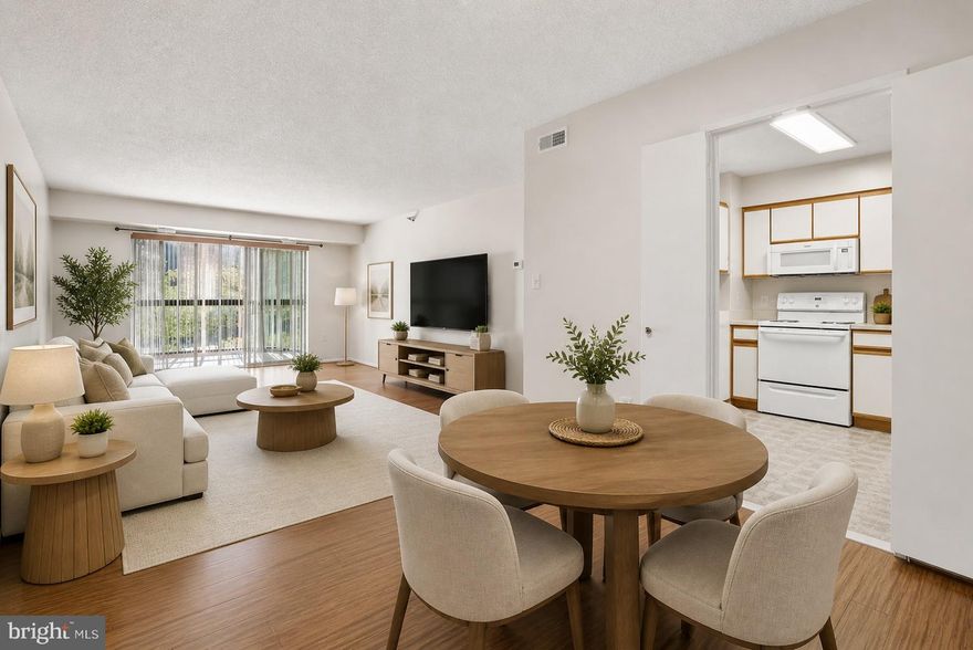 Located in the desirable Fairways North at Leisure World—a secure, lively gated community—this popular G model home offers comfort and convenience in a well-planned layout. Inside, you’ll find two spacious bedrooms set on opposite sides of the unit, each with its own private bath. One suite even includes the added benefit of an in-room washer and dryer. The bright, open living room extends into a glass-enclosed sunroom, creating a natural blend of indoor and outdoor living. A table-space kitchen sits next to a separate dining room, ideal for both casual and formal meals. With 1,195 square feet of thoughtfully designed living space, this residence provides plenty of room for everyday comfort. Freshly painted and positioned on the first floor, it also offers easy access to parking, plus the bonus of extra storage in the basement. The building features a welcoming community/party room for movies, games, and social gatherings, encouraging neighborly connection. Beyond the building, Leisure World spans over 600 acres and functions as a self-contained retreat, complete with a gated entrance for peace of mind. Residents enjoy an impressive variety of amenities, including an 18-hole golf course, walking trails, serene lakes with fountains, on-site dining, tennis courts, and both indoor and outdoor pools. Creative and wellness pursuits are supported by art studios, a library, a fitness center, and more. This home represents a rare chance to enjoy a lifestyle of ease, recreation, and community in the renowned Leisure World—an inviting haven!