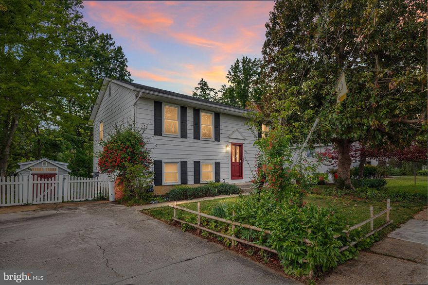 **OPEN HOUSE 5/2&5/3 11-1** Welcome to Colony Hills, one of Eastport’s most coveted neighborhoods, where charm, convenience, and community come together, and there’s NO HOA. This property offers the perfect blend of comfort and lifestyle, ideally located just minutes from everything you love about Annapolis. Step inside the upper level and you’re immediately greeted by a light filled living space, highlighted by a beautiful bay window that floods the room with natural light. The tastefully updated kitchen is a standout, featuring white cabinetry with underlighting, quartzite countertops, stainless steel appliances, and gas cooking. There’s ample space for a large dining table, perfect for everything from casual weeknight dinners to hosting friends and family. On this level, you’ll find two spacious bedrooms with generous closet space and a full bathroom. The lower level offers even more room to spread out, with a large second living area anchored by a cozy Timberwolf wood burning stove, ideal for relaxing nights in. A third bedroom and second full bathroom provide flexibility for guests, a home office, or additional living space. You’ll also appreciate the sizable storage and laundry area. Outside is where this home truly shines. The back deck overlooks peaceful woods and a small creek that feeds into Hawkins Cove, creating a serene, nature filled backdrop. The fully fenced backyard is perfect for entertaining, complete with a patio and a 10x16 shed with electric, ideal for woodworking, hobbies, or extra storage. Thoughtfully landscaped with Maryland native plants and pollinators, this yard is a true retreat.  Enjoy the ease of parking in your private driveway, all within a sidewalk lined, tree filled neighborhood. *2025 Dual Fuel Electric/Gas HVAC installed* 2026 New Carpet and Freshened Paint* 2021 New Windows Installed* Newer Washer and Dryer*Living here means you’re just a short walk to Eastport favorites like Vin 909, Adam’s, and Sammy’s, or a quick bike ride to Downtown Annapolis, Quiet Waters Park, and Pip Moyer Recreation Center. Commuting is a breeze with easy access to major routes, USNA, NSA Annapolis, Ft. Meade, Baltimore, Washington DC, and BWI. This is the one you’ve been waiting for. Schedule your showing before it’s gone.
