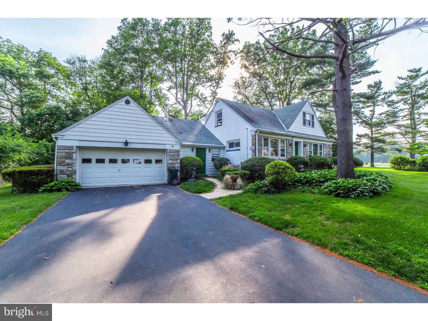 This home will surprise you with incredible space and amenities.  A traditional looking Cape style home possesses a spacious Family Room addition featuring a vaulted beamed ceiling, wood burning stove, mudroom/back door entrance with closets and attached 2 car garage. Adjacent enclosed patio opens to a lovely level rear yard.  Main Level also features Living room with fireplace and picture window, Formal Dining room, Eat-in-kitchen, 1 Bedroom and full bath.  On the 2nd floor, there are 2 additional Bedrooms, one with an adjoining sitting room/office. Hardwood floors.  Basement is full with storage and a laundry room.  Recently professionally waterproofed.  Converted to gas heat, this home has a newer Furnace and central air conditioning.  Super location across the street from one of Radnor's most popular parks with playing fields and tennis courts. Public transportation, shopping, and the Radnor Trail are all within a short stroll.