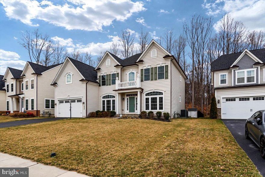 Welcome to sought after Wilsons Grove!  This gorgeous NVR home boasts a fenced-in wooded premium lot,  2-story living room ceilings, huge kitchen with an extra-large island, his and hers walk-in closets in the master bedroom,  huge master bath with soaking tub,  and finishes everywhere that you'd expect in an NVR home.   Enjoy entertaining friends and family on the screened-in porch, or turn on the gas fireplace on cold winter nights; and your yard has irrigation system on the front, back and side of the home; this home has it all!  There is lots of storage, on the lower level and the main level.  The community pool is open Memorial Day weekend - Labor Day and is enjoyed by the neighbors in Wilsons Grove during the summer.