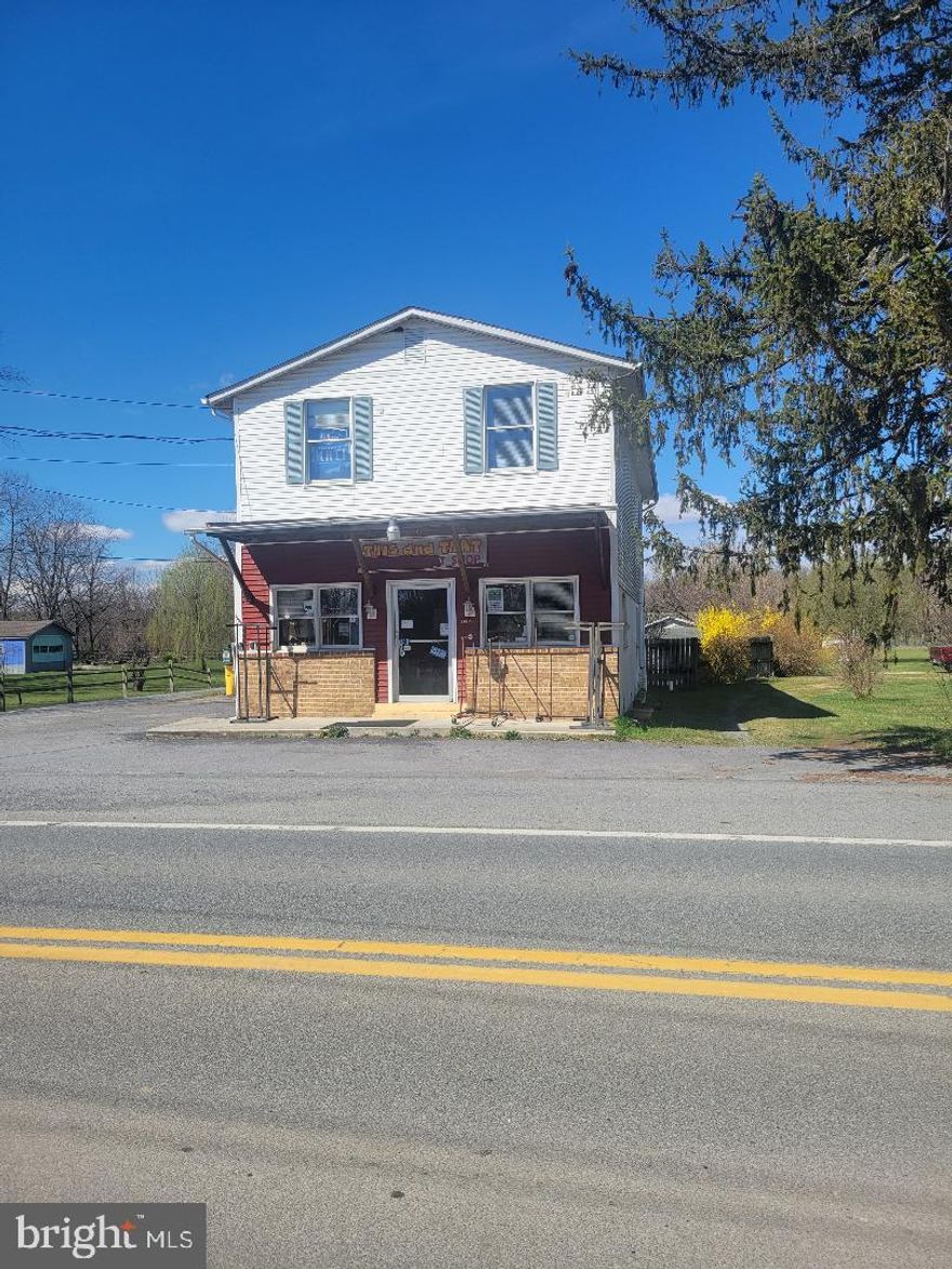 If you are looking for that opportunity to live and work at the same location.  The current owner operates the gift/consignment shop and rents out the apartments,  A few cosmetic upgrades and this can become uniquely yours.