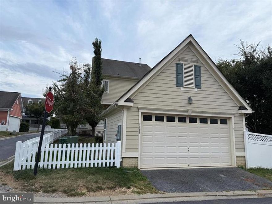 This home has an amazing classic community inverses model with all the upgrades! Hardwood throughout main level, main level features formal living and dining rooms, family room and a gourmet, eat in, center island kitchen with granite counters & upgraded 42' cabinets, lots of windows, crown molding, additional parking next to detached garage. Close to good schools, shopping, restaurants, I-270! EV Charge is installed. The basement is half finished. The total area, including the basement is 4,260 sq.