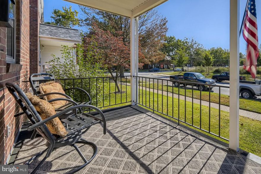 They say that things come back in style.. But it's never left this lovely town home in Old Dundalk,,,, across the street from beautiful Heritage Park.. Home of the heritage Fair And the Dundalk parade!.... This community's pride and joy annual celebration! Tree-lined streets welcome you to this community. We'll start with the covered front porch which is perfect For three seasons of the year, being across from the park, especially now as the leaves are turning for fall. So many original details, In addition to the sellers own personal touches and woodworking craftsmanship. Open floor plan with original yellow pine flooring compliments the art deco tiles in the dining room and kitchen.. All of the interior doors have been refurbished and still have their unique original hardware. Custom woodworking includes yellow pine and oak door trim and window casings, wainscoting and chair rail, and custom radiator covers. A newer boiler, radiators are the best heat that burn clean and efficient with no filters to change.. The built-in shelving in the dining room couples for bookcases, cupboard space or more cabinetry. Natural wood cabinets are complimented by tile back splash, Corian counters and black faced appliances.. there are three bedrooms upstairs and a full bath. The window in the bathroom adds to all of the natural light throughout this home... Black and white octagon and subway tiles.. Closets, storage and attic space. Iron railings also compliment the decor. The basement still has knotty pine and also wood flooring. This could be an extra bedroom, office or homeschooling space and there's a bonus room that can be used for more storage or work room.. laundry with washer and dryer and utility area and half bathroom so there's plenty of room for storage or extra living space. The walkout stair and bilco doors lead to the yard. Being an end of group you have the front yard, and side yard for green space or gardening, there's also patio space and a garage as well as a parking patio secured by fencing, gates and garage door. The garage also has 220 electric! New roof in 2019.   Thank you again  for touring this home       Holidays are right around the corner and it's just enough time to prepare for celebration!