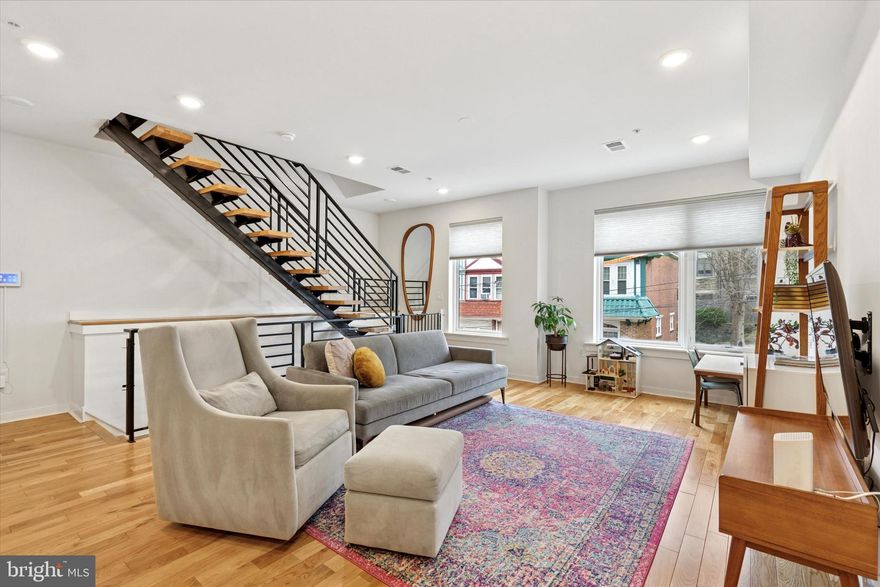 23 E Durham Street, B2, is a beautiful 3 bedroom, 2.5 bath townhome with parking (!) nestled in the desirable Mount Airy neighborhood! Built in 2021, this inviting home offers a perfect blend of character and modern updates, providing both comfort and style. The spacious interior features wood floors throughout, large windows that allow natural light to pour in, and generous living spaces that create a warm and welcoming atmosphere. The heart of the home is the beautiful kitchen, complete with sleek countertops, stainless steel appliances, two tone cabinets, subway tile backsplash, ample storage, and a walk in pantry. It flows effortlessly into the dining area and living area, making it perfect for both everyday meals and entertaining guests. This floor also houses a coat closet and the powder room; no need for your guests to leave the main floor.  Upstairs, you'll find well-sized bedrooms, including a primary suite that provides a peaceful retreat with plenty of closet space. The full bath is thoughtfully designed with modern fixtures and finishes. Two additional bedrooms that share a hall bathroom and the convenient laundry center placed in the bedroom hallway, along with the linen closet. Enjoy the outdoors on your private roof deck, ideal for relaxation or perfect for entertaining with the wet bar at the top of the landing.  All this and deeded parking! With easy access to local shops, restaurants, and parks, 23 E Durham Street offers the perfect combination of suburban tranquility and city convenience. Don’t miss the opportunity to make this charming home yours. Schedule a showing today and experience all that Mount Airy has to offer!