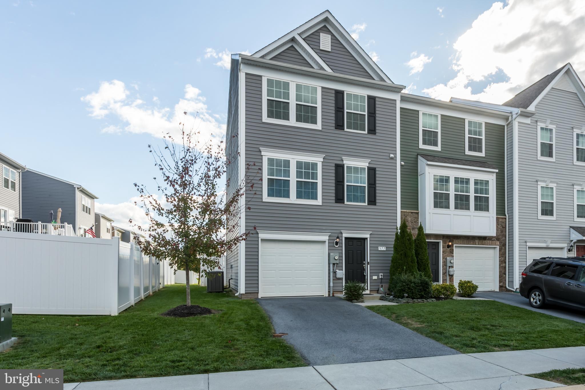 This towhome, built in 2018, boasts close to 2,000 finished square feet across three levels of living space, with the luxury of newer amenities. This home is only minutes away from a variety of differnent eateries, shopping centers, convenice stores, as well as around 40 minutes from Leesburg for all you commuters. On the main level you have updated stainless apliances with granite counter tops in the kitchen; which flows into the living room with an additonal half bath. Off of the main level you have a very spacious trex deck allowing possibilities for your social gatherings, morning coffee, or afternoon cool down. The top level conveys 3 bedrooms, 2 full bathrooms, vast primary suite conveying a walk in closet. The primary bathroom provides a double vanity, walk in shower, and soaking tub! The two additional bedrooms are nice sized with plenty of closet space. The bottom level of the home supplies 460 square feet of recreation room, half bath, and laundry area with a washer and dryer that convey with the home. This also has an attached garage for your additional storage needs or prized show pieces. The fenced in backyard is perfect for the pup, with a tall vinyl privacy fence, as well as a storage building for your landscape essentials. The benefits of a newer home and the views of an established community without new contruction at your front door. Dont miss this opportunity!