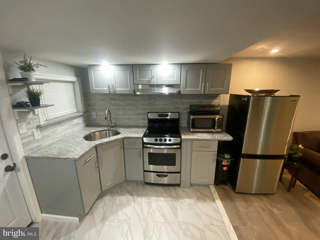 Two blocks to the Frankford El, connecting to center city. Three unit multifamily home with all legal permits houses 3- 2bedroom, 1 bathroom apartments in very good condition. Unit 1 lease just increased from 1000 to 1300 per month and is month to month. Unit 2 has a lease that expires in August at 1000. Unit 3 is vacant and recently put on the market at 1350. There is a driveway and garage for the first floor unit. Backyard is wide open space. Great for investment portfolio or live in one unit and rent the other two to offset your mortgage and taxes. Washer and dryer in each unit.