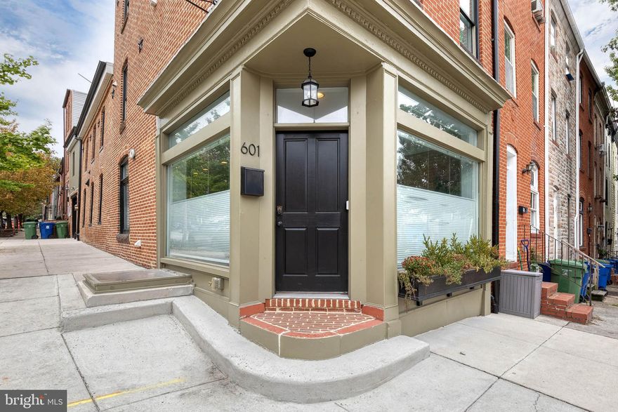 Exceptional Properties. Exceptional Clients.
OFF-STREET PARKING ATTACHED GARAGE | ROOFTOP TERRACE | 2 YEARS OF CHAP TAX SAVINGS REMAINING
Welcome to 601 S Patterson Park Avenue —originally built in 1920 & thought to be a corner store, had been exquisitely restored (Renovated by Building Character with all new systems). This four-level end-of-group luxury townhome showcases sophisticated design, spacious living, and modern city convenience. Featuring 5 bedrooms, 4 full baths, and 1 half bath, this residence includes a rooftop terrace, attached garage, and premium finishes throughout. The main level is bathed in natural light, offering an open-concept layout that seamlessly connects the living, dining, and kitchen areas. The gourmet kitchen boasts soapstone countertops, a large island, and stainless steel appliances, creating a perfect space for both everyday living and entertaining. A powder room, garage access, and secondary rear exit complete this level. The upper levels feature four spacious bedrooms and three full baths, including an impressive primary suite with dual walk-in closets and a spa-inspired bath with a soaking tub, double vanity, and rainfall shower. The fourth level offers access to a spectacular rooftop deck, complete with a wet bar, ideal for entertaining guests or enjoying the cityscape. The fully finished lower level adds versatility with a fifth bedroom and full bath, perfect for a guest suite, family room, or home office. Situated just one block from Patterson Park and a short stroll to The Waterfront Promenade, restaurants, and grocery stores, this home provides effortless access to I-95, I-895, Canton Crossing, and Canton Waterfront Park. Experience elevated city living where luxury, location, and lifestyle come together seamlessly at 601 S Patterson Park Avenue.