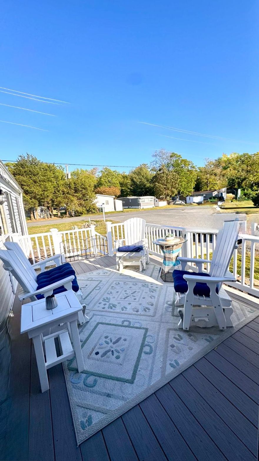 Welcome to Shady Park, a friendly all ages community in Selbyville, DE, known for its welcoming atmosphere and active community events with a voluntary HOA. This charming 2 bedroom, 2 full bath home is located on a corner lot and features coastal décor and a bright, airy layout with1,120 sq. ft. of interior living space, which includes the 140 sq. ft. sunroom, perfect for enjoying morning coffee or relaxing year round in natural light. Step outside to the 120 sq. ft. deck, complete with an automatic awning, ideal for outdoor dining and entertaining. Additional features include a two door storage shed for tools, bikes, or beach gear.
Shady Park offers water access to Dirickson Creek, which flows directly into Little Assawoman Bay featuring a boat ramp and kayak launch, along with a picnic area and water views, providing residents with direct water-oriented recreation.
This partially furnished home offers comfortable, low maintenance living just minutes from area beaches, shopping, dining, and medical facilities—this home is perfect as a primary residence or coastal getaway.
Just minutes away, Bayside Marketplace serves as the area’s premier neighborhood shopping destination, anchored by Harris Teeter and complemented by upscale conveniences including Starbucks, wine and spirits, specialty dining, banking, and personal services—all with the benefit of Delaware’s tax free shopping.  Residents also enjoy nearby access to Food Lion for everyday essentials, along with a curated mix of local markets and specialty grocers offering fresh foods, baked goods, and regional favorites. Charming boutiques, gift shops, fabric and quilt stores, jewelers, and artisan retailers line Selbyville’s historic Church Street, providing a relaxed, small town shopping experience with coastal character.
