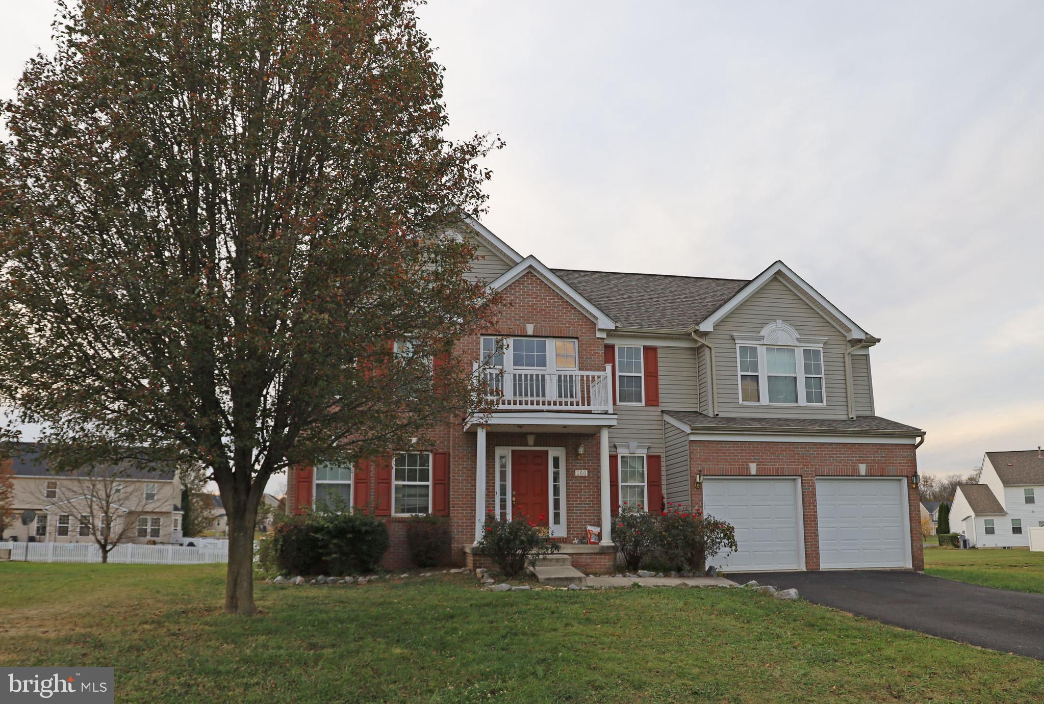 A spacious four-bedroom, 2.5-bathroom colonial home available for rent in South Berkeley County! This property features updated flooring on the main level, recessed lighting throughout, and formal living and dining rooms perfect for entertaining. The family room, just off the kitchen and breakfast area, features a gas fireplace. The primary bedroom highlights include a cathedral ceiling, an expansive walk-in closet, and ample space for a quiet retreat. Three additional bedrooms are generously sized and share a full bathroom. The home also includes a two-car garage and an unfinished basement for added storage or potential workspace. Appliances will be installed before move-in. Application fee is $55 per adult.