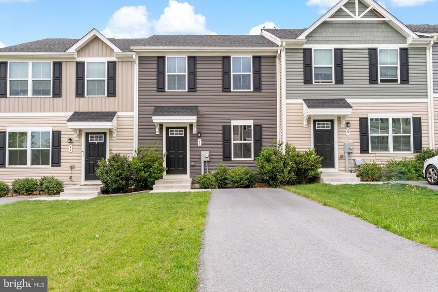 Just built in 2021, this like new townhome is in great condition and move-in ready! Walk in on the main level that features an open concept with a spacious living room and a dining area just off the kitchen, perfect for entertaining and enjoying every moment. A half bath is also on this level for convenience. Upstairs you'll find 3 bedrooms and 2 full baths, including the primary suite with walk-in closet. The unfinished, walk-out basement provides plenty space to add more living area or create your rec room. Located in the community of Stonecrest, you'll be close to local schools, shops, and restaurants.