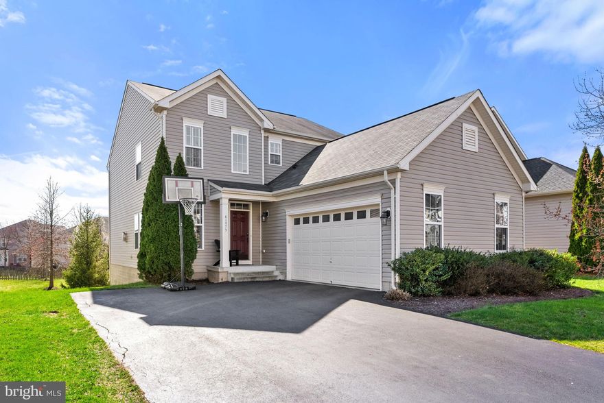 Nestled in the heart of Aldie, Virginia, this captivating single-family home seamlessly blends modern upgrades with timeless elegance.  Step inside and discover a light-filled haven designed for modern living.  Sunshine spills through the windows, illuminating the open floor plan on the main level, creating a welcoming space for family and friends. 

A cozy fireplace in the family room beckons for warm gatherings, while the elegant formal dining room seamlessly flows from the living space, ideal for hosting festive dinners. Unleash your inner chef in the recently updated kitchen, featuring sleek, freshly painted cabinets, a modern backsplash, and a brand new range to inspire culinary creations. 

Head upstairs to discover four spacious bedrooms, ideal for families or guests. The luxurious master suite provides a private sanctuary, complete with dual walk-in closets and a spa-like bathroom featuring a separate shower and soaking tub. A recently updated hall bath adds convenience for everyone. Two additional bedrooms upstairs were freshly painted in 2022, ensuring a move-in ready masterpiece.

On the lower level, the finished basement offers an additional space to personalize.  Features a workout haven with gym flooring, and an additional bedroom/den complete with a full bath.

Step outside and unwind on the spacious Trex deck (built 2 years ago), perfect for enjoying fresh air and sunshine while entertaining friends and family. 

This inviting Aldie home offers a peaceful retreat conveniently located within the Stone Ridge community. Unwind by the sparkling pool, energize your body in the state-of-the-art fitness center, or explore miles of scenic trails. The clubhouse provides a perfect venue for social gatherings, and playgrounds offer a space for children to explore and make memories.

This property boasts a fantastic location, just steps away from the historic downtown area with exceptional restaurants, shopping, and leisure options.   Convenient location right off of Rt. 50 and with easy access to Dulles International Airport, Route 66, and Washington, D.C. makes commuting a breeze . Don't miss your chance to own this captivating property and become part of a vibrant Aldie lifestyle! Contact us today to schedule a showing and discover all the additional features that make this your dream home.