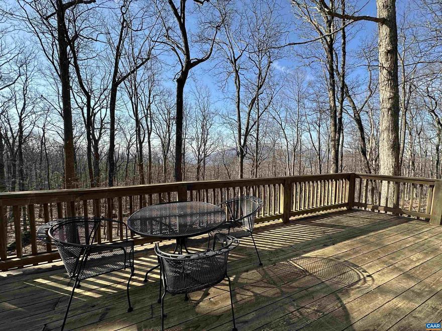 This is your chance to own a charming, updated mountain retreat just minutes from the heart of Wintergreen. Inglenook is a thoughtfully renovated cottage offering seasonal mountain views, a private setting backing to WPOA open space, and outdoor living areas designed to enjoy the natural surroundings. The main level features two bedrooms and a full bath, along with an airy, light-filled living space highlighted by soaring ceilings, gleaming hardwood floors, and an open, welcoming feel. Wraparound decks extend the living space outdoors?perfect for relaxing, entertaining, or enjoying crisp mountain air. Upstairs, a private primary suite provides separation and privacy, while the terrace-level rec room and half bath offer flexible bonus space for guests, hobbies, or media use. A compact, corner spiral staircase connects all three levels while preserving valuable living space throughout the home. Well-suited for gatherings, weekend escapes, or a full-time mountain lifestyle, this home blends comfort, character, and convenience in a serene setting.,Wood Cabinets,Fireplace in Living Room