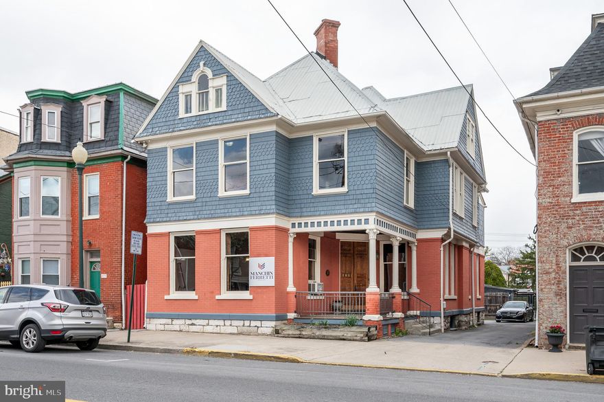 MULTI USE PROPERTY-Only ONE mile from Interstate 81 leading to MD & VA. Last used as a professional business with 12 individual offices that include a large meeting room. Renovations would need to be completed to remodel back to the original glory days of a residential home-but could be done. Located in Historic Downtown Martinsburg. Close to public transportation-train & bus, library, shopping, restaurants, apartments, parks and much more. The original beautifully stained wood remains in a lot of the property. TWELVE offices FOUR bathrooms plus breakroom space. Lots of room for storage even in the dry basement. Parking lot located behind building. On street parking also available.