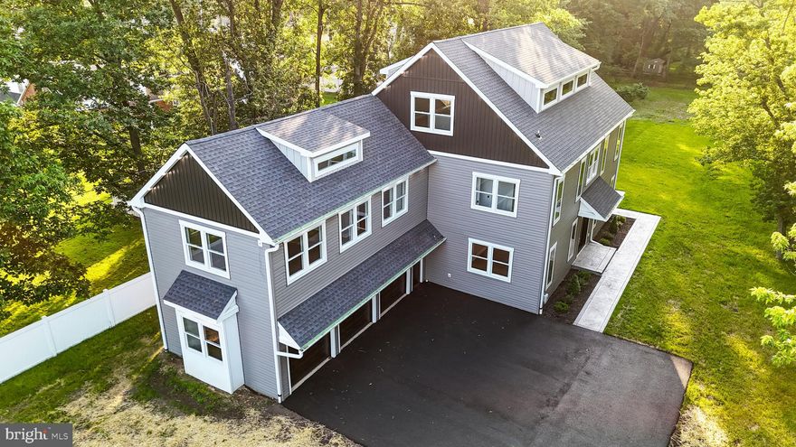 Welcome to this one-of-a-kind new construction home, perfectly situated on nearly an acre of land (.92 acres) and offering over 4,500 square feet of thoughtfully designed living space. Crafted with luxury in mind, this home features two primary bedroom suites—one on the main level and an even larger retreat on the second floor—making it ideal for multigenerational living. As you step inside, you’ll be drawn to the stunning kitchen, showcasing a two-tone cabinet design that reaches the ceiling, under-cabinet lighting, quartz countertops, and stainless steel appliances. The kitchen flows seamlessly to a spacious concrete patio, perfect for entertaining or relaxing with a view. A large three-car garage provides plenty of space for vehicles and storage. Upstairs, discover beautifully appointed secondary bedrooms and a stylish hall bath with designer tile and a solid wood vanity. But the surprises don’t stop there—head up one more level to find a massive flex space ready to become whatever you envision: a game room, home bar, theater, gym, or creative studio. The possibilities are endless. Don’t miss this rare opportunity to own a custom home with high-end finishes, flexible living spaces, and room to grow!