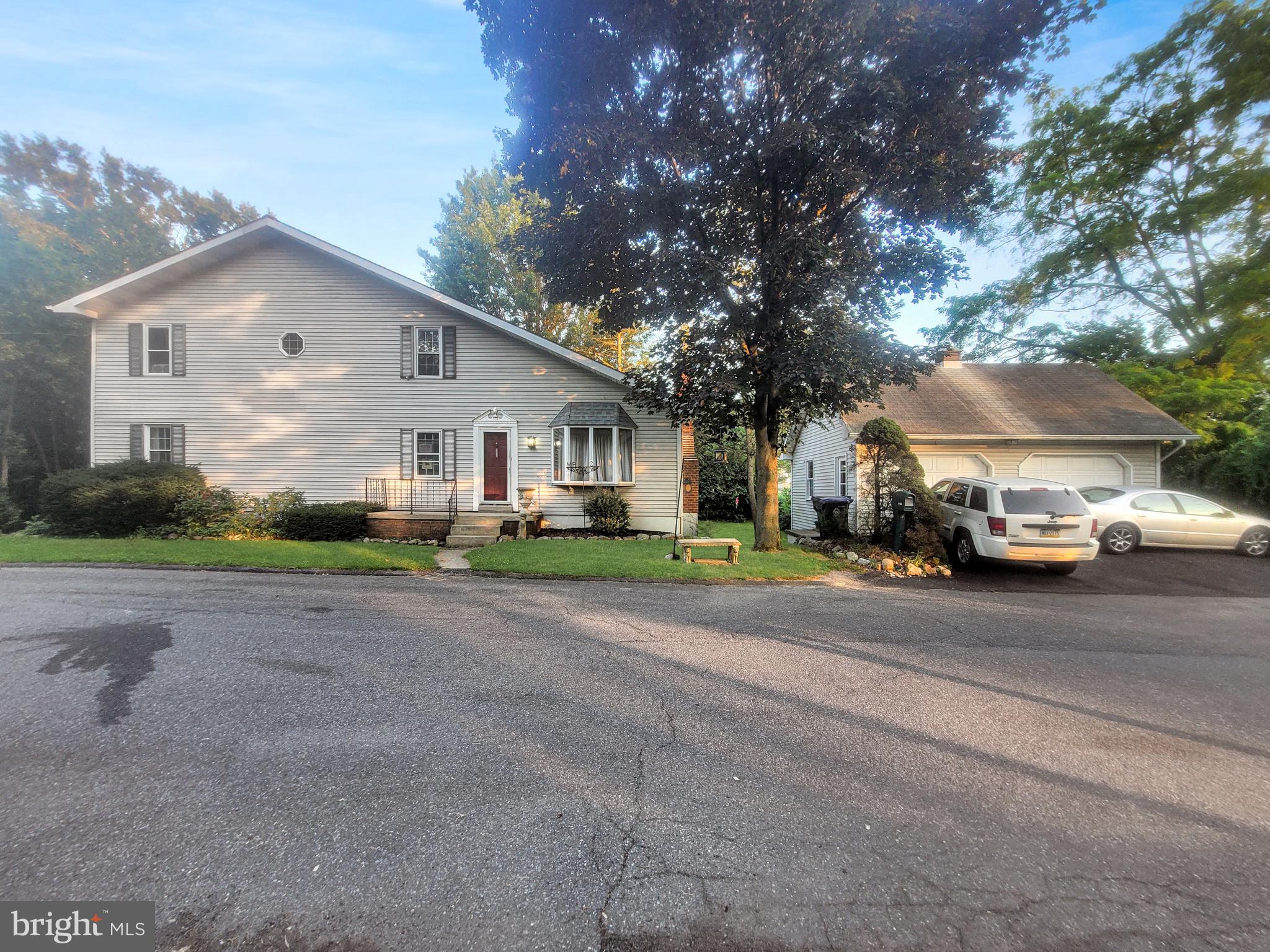Welcome to 1710 Illingsworth Ave, an inviting 3-bedroom, 2.5 bath home, with a detached 2-car garage, back yard retreat, and comfortable living spaces across three well‑proportioned levels. Situated in a vibrant area of Allentown, and just moments from shopping, parks, schools, and major thoroughfares. This home is move‑in ready and brimming with potential. The main level welcomes you with a spacious living room featuring a wood‑burning fireplace with a brick surround and a bright bay window. Alongside the living room is the kitchen with classic solid wood cabinetry. A convenient full bath, with a stand‑up shower, and a versatile bonus room, used as a bedroom, home office, or formal dining room. Upstairs are two generously sized bedrooms with ample storage, including a walk‑in closet, complemented by a full bath with dual sinks and a tub‑shower combo. The finished lower level of the home consists of an inviting den with sliding glass doors leading to the lush backyard, featuring a full bar with a butcher block bartop and a wood‑burning stove. Down the hall is another living space which could be converted into a fourth bedroom, office, or children's playroom. An additional half bath and laundry area complete this level of the home. Step outside to your own backyard retreat, a relaxing Zen‑like space with a covered porch, a charming stone‑lined stream, with a bridge providing access from the porch to the yard, with vibrant landscaping, making it the perfect place for unwinding or entertaining. Parking and storage is generous at this home with a detached two‑car garage with 3 levels of its own, including overhead attic storage, and a basement beneath for tools and lawn maintenance items, plus a private two‑car driveway! This home is ready for its new owner to enjoy. Sold in its current as‑is condition and ready to make your own. Allentown, the third-largest city in Pennsylvania and the heart of the Lehigh Valley, offers a rich tapestry of cultural amenities, from the Allentown Art Museum to the Great Allentown Fair. Convenient highway access and a vibrant community atmosphere make this home a smart buy for those seeking both convenience and character. Don’t miss this opportunity to buy a home with unique charm and potential. Call the Listing Agent today to schedule your private showing!
OPEN HOUSE STYLE SHOWINGS AVAILABLE TO TOUR THIS HOME ON:
- SUNDAY 8/24 @ 5:00-6:30
- WEDNESDAY 8/27 @ 5:00 -6:30
- SUNDAY 8/31 @ 5:00-6:30,
Please just let the listing agent know you're coming to arrange the visit.