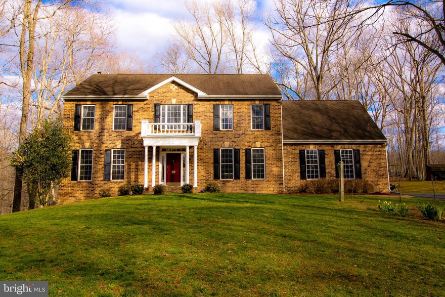 ***Stunning Colonial Dream Home*** Luxurious colonial-style home on eight sprawling acres of tranquil Virginia forest land with tree-lined private road. Kitchen with breakfast sunroom opens to deck with breathtaking view. Impeccably well-maintained home with unmatched privacy & seclusion and accessibility to local attractions. Renovations include: brand new Leaf Filter gutters, fresh paint throughout, hardwood floors on top floor, tile in basement, stainless steel kitchen sink and quartz counters. Living area features open floor plan, crown molding, gleaming red oak wood floors, large windows with natural light and stone fireplace with premium cast iron High Valley stove. Upper level features four bedrooms with beautiful scenery, including spacious master bedroom with walk-in closet. Fully finished basement offers recreation room, fifth bedroom with full bath and private entrance. Includes two-car garage with large private driveway and a spacious front yard. Virginia Country living at its finest. Explore the surrounding lush, green forest, garden with fresh well water or soak in the jacuzzi on the stone patio. Recreation Residential Zone 5 and no HOA! Move-in ready. This stunning home is sure to rent quickly. Don't miss your opportunity to live in one of VA’s most beautiful properties!