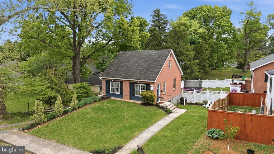Opportunities like this rarely surface in walkable, historic Charles Town. A classic brick cottage at this price point, just a short walk to Jefferson Memorial Park and the charming downtown, offers a compelling entry into one of the area’s most consistently sought-after settings.

Inside, the home balances original character with practical updates. Hardwood floors run through the main living areas and upstairs bedrooms, while the kitchen and bath feature durable laminate flooring. The main level includes a bright living room, separate dining space, and an updated kitchen with quartz countertops and a butcher block island. A full bath with tub and shower combo completes this level, along with a flexible bonus room that can serve as a third bedroom, office, or additional living space.

Upstairs, two bedrooms with sloped ceilings bring architectural character and a more intimate feel. The partially finished walkout basement adds useful square footage with freshly painted concrete floors, a dedicated laundry area, and space for a workshop, storage, or hobby use.

Set close to downtown shopping and dining, WVU Medical Center, Hollywood Casino, and major commuter routes, this property offers a straightforward, low-maintenance option in a location where availability at this price point is increasingly limited.