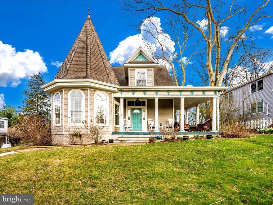 This stunning Victorian will take your breath away! This homes greets you with over 2600 SF of updated finished living space,  original Heart Pine Flooring, Soaring Ceilings, Pocket Doors and a Turret! The kitchen has Mahogany Counters, a Soapstone Farm Sink, Customer Built Cabinets with lighting , Stainless Appliances and a Butler Style Pantry. There is a lovely Dining Area with doors that lead to the library with Custom Built-In Shelving and a Gas Fireplace. The Huge Living Room in the front of the house is in the turret and has floor to ceiling windows with amazing natural light. The addition off the back of the home has a Brand New Roof and is used as the Family Room. There is a Primary Bedroom on the Main Level with a Walk-in Closet and an Updated Full Bathroom.  The owner had Customer Built-In Shelving/Storage inset to the wall that runs from the Library to the Walk-In Closet in the Primary Bedroom. The Upper Level has another Primary sized Bedroom, with an additional space in the turret that can be used as an office, art studio, nursery, sitting room, etc. In addition, there are two more nice sized bedrooms and a lovely Updated Bathroom with Skylights. The Laundry Space in upstairs as well. At the end of the upstairs hallway there is a door that leads to a Brand New Deck to Enjoy the Views of your Backyard. This home boasts just over 1/2 acre with a shed and a fenced in side yard. The location is amazing with I-70 a few minutes away and within walking distance to all the wonderful shops and restaurants that downtown Mount Airy offers. This home is a must see.