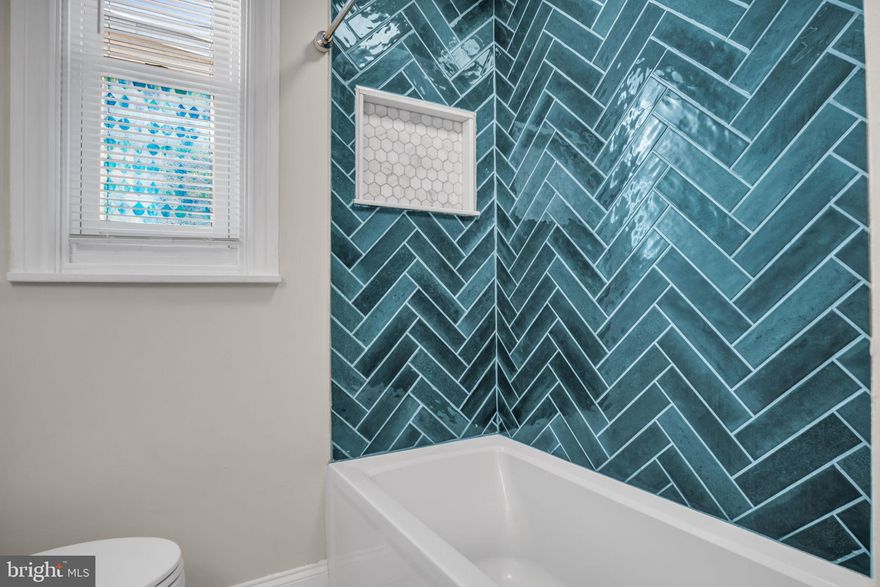 Nestled in the heart of the Midtown Historic District, this stunning interior row townhouse, built in 1890, is a true testament to timeless craftsmanship and contemporary design. With 1,590 square feet of potential, this property invites you to reimagine its spaces and create a home that reflects your unique style. The exterior, adorned with classic brickwork, exudes character and charm, while the contemporary architectural style offers a fresh twist that harmonizes with the historic surroundings. Step inside to discover a canvas ready for your vision-an open layout that encourages creativity and flexibility, perfect for entertaining or quiet evenings at home. Natural light floods through the windows, illuminating the rich textures and details that define this residence. The basement offers additional space for storage or a workshop, enhancing the functionality of this remarkable property. Conveniently located within 5 miles of a commuter rail station and less than 10 miles from the airport, this home provides easy access to the city while maintaining a serene neighborhood atmosphere. On-street parking ensures that your guests will always find a place to visit. Embrace the opportunity to own a piece of history and transform it into your dream home. This property is not just a house; it's a canvas for your aspirations. Don't miss your chance to make it your own!