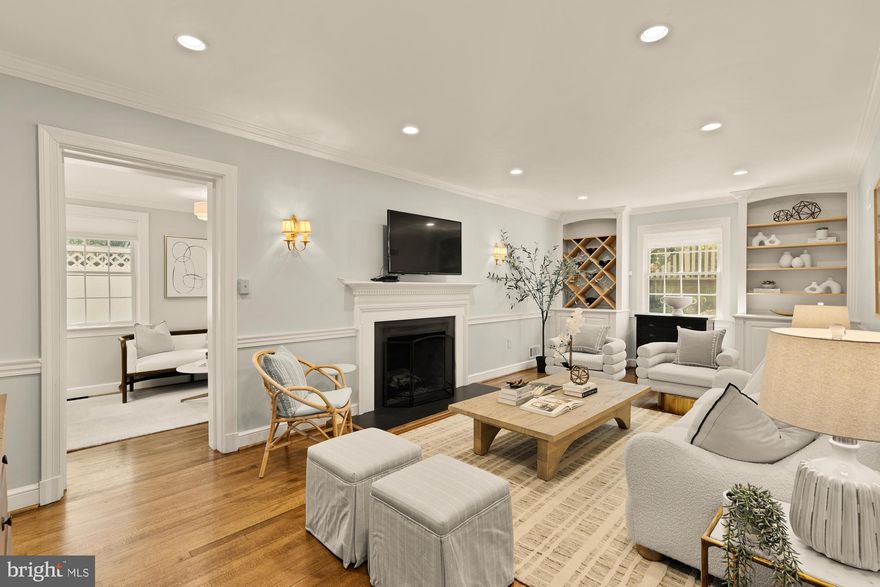 Blending classic elegance with thoughtful modern updates, this beautifully maintained home showcases exceptional craftsmanship, refined finishes, and truly turn-key living—all in a prime commuter location. Perfectly situated along a vibrant, accessible road, this property offers easy Beltway access, a low-maintenance yard, and lovely views of the Belle Haven Country Club—a commuter’s dream with a touch of tranquility.

A welcoming stone front porch invites you in, surrounded by lush gardens, mature landscaping, and serene water features—a peaceful retreat ideal for relaxing or entertaining. Inside, the home exudes warmth and sophistication with custom built-ins, a stately fireplace, crown molding, and beautiful woodwork. The formal dining room sets the stage for memorable gatherings, while the all-season room provides a seamless connection to the outdoors.

At the heart of the home, the updated kitchen combines timeless style and modern functionality with granite countertops, luxury appliances, and an integrated Sub-Zero refrigerator. A sunny breakfast area opens to a flagstone courtyard, perfect for morning coffee or alfresco dining.

Upstairs, the primary suite offers a private retreat with an en-suite bath, private balcony, and lovely treetop views. Two additional bedrooms and a versatile bonus room provide flexible living options for guests, a home office, or a playroom.

Outside, stone pathways, vibrant gardens, and a tranquil pond create a private sanctuary. A full-house generator and irrigation system ensure easy, low-maintenance living. Whether dining, entertaining, or simply unwinding, this home blends timeless beauty with modern comfort and convenience.