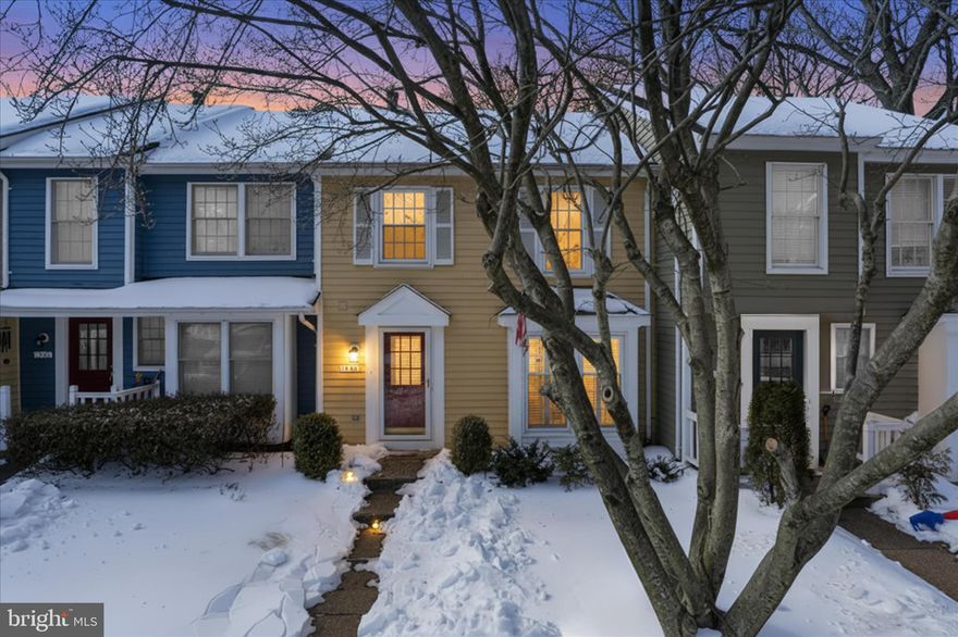 Welcome to this beautifully updated, turn-key townhome in the highly desirable Chestnut Ridge cluster of Reston—a rare opportunity to own a home with exceptional value, modern updates, and an unbeatable location. 
This home sits back from the street with excellent curb appeal and a welcoming walkway to the front door. Step inside to find a bright and open main level featuring a beautifully updated half bath, a spacious family room with a bay window, plantation shutters, recessed lighting, and abundant natural light—creating a warm and inviting space to relax or entertain.

The open flow continues into the kitchen and dining area—large enough for a farmhouse table and buffet—making it ideal for everyday living and hosting gatherings. The kitchen features crisp white cabinetry, black fixtures, and stainless steel appliances, creating a clean, modern aesthetic.

Step through the sliding glass door to an expansive deck overlooking protected parkland, perfect for outdoor dining, barbecuing, and extended outdoor living. The serene setting provides a peaceful retreat while still being close to everything Reston has to offer.

Upstairs, the primary suite features a vanity area and a walk-in closet, plus a very large second bedroom (Fairfield model). With appropriate contractor evaluation and approvals, this space could potentially be reconfigured to suit future needs. The updated hall bath includes a newer vanity, tile surround tub/shower, and modern light fixture.

The lower level provides a cozy, walk-out living space with luxury vinyl flooring and a wood-burning fireplace, plus a laundry/utility area with full-size washer and dryer, a half bath, and ample storage. The lower level opens to a lower platform deck and partially fenced yard, ideal for morning coffee or evening relaxation.

This home offers almost $40,000 of recent updates in the last few years by the current owner.  These include a new HVAC system, new carpet on the stairs and upper level, new water heater,  popcorn ceilings removed,  fresh paint throughout and deck rehab.  Additional updates estimated in the last 6 to 8 years include a new roof, updated windows, hardwood floors on the main level, updated bathrooms, and a Pella sliding glass door, making this home truly move-in ready. 
Location is a major highlight—this home is within walking distance to North Point Village Center, offering everyday convenience and dining including Giant Food, Starbucks, Gregorio’s Trattoria, Chick-fil-A, California Tortilla, Baskin-Robbins, and more, plus a variety of shops and services. It’s also just minutes to Reston Town Center, where you can enjoy premier dining, shopping, entertainment, and events such as Barcelona Wine Bar, Ted’s Bulletin, Morton’s The Steakhouse, Jackson’s Mighty Fine Food & Lucky Lounge, and LOOK Dine-In Cinema.

This is a rare chance to own a beautifully updated home in a prime Reston location—don’t miss it!