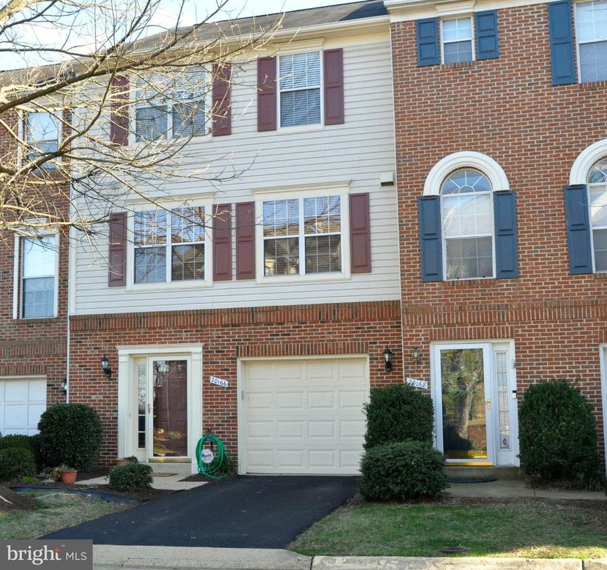 1 Car Garage Townhouse w/3 BR s, 2.5 BA s on 3 Finished Levels. Open Floor Plan w/ Hardwood Floors, New Carpet, New Paint, Fairly New HVAC and Water Heater. Separate Dining  and Living RM w/Access to Deck. Walk-in closet in Spacious Master Bedroom w/ Sitting Area.  Enjoy The Lower Lvl Rec Room w/ Gas Fireplace, Additional Storage, Rough-In for Bathroom & Walk-Out to Fenced Rear Yard.