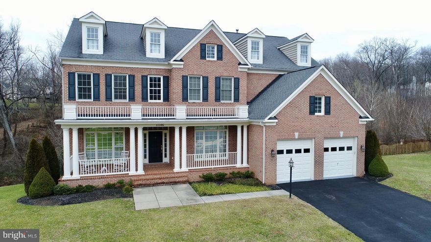 Stunning custom brick Colonial in Ijamsville. 5 beds, 4.5 baths.  6,300+ square feet of finished living space!  Family room has stone floor-to-ceiling fireplace. Gourmet kitchen with upgraded granite counters, SS appliances including 6 burner stove, and breakfast bar.  Formal dining room, living room, office space.  Finished lower level with large rec room, wet bar, and media center.  Deck overlooks forest views and meticulous landscaping. Great cul-de-sac location in Windsor Knolls community!